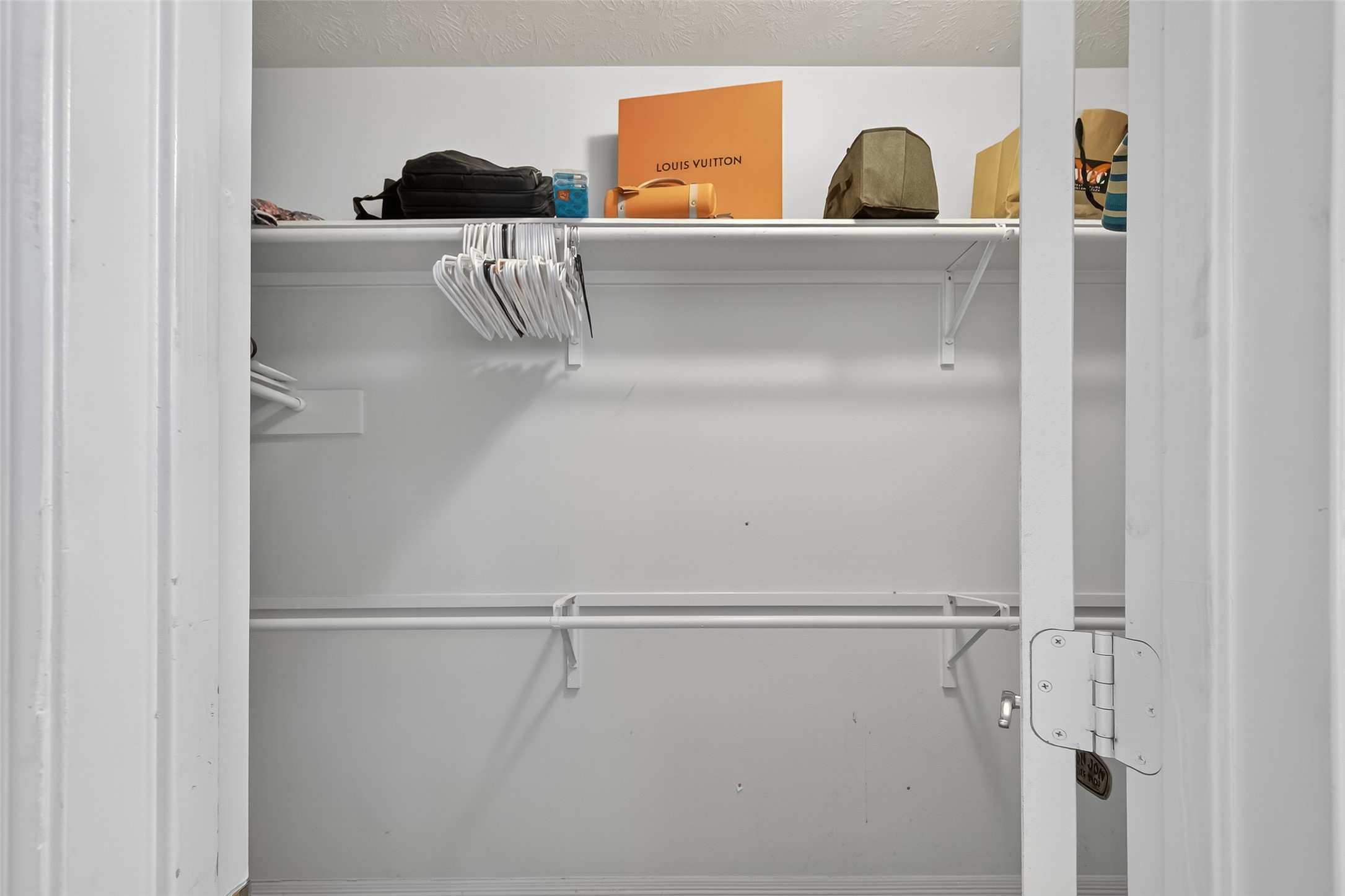 19207 Pinewood Mist Lane Humble, TX 77346 - Photo 16 of 29 a close view of a closet and dryer