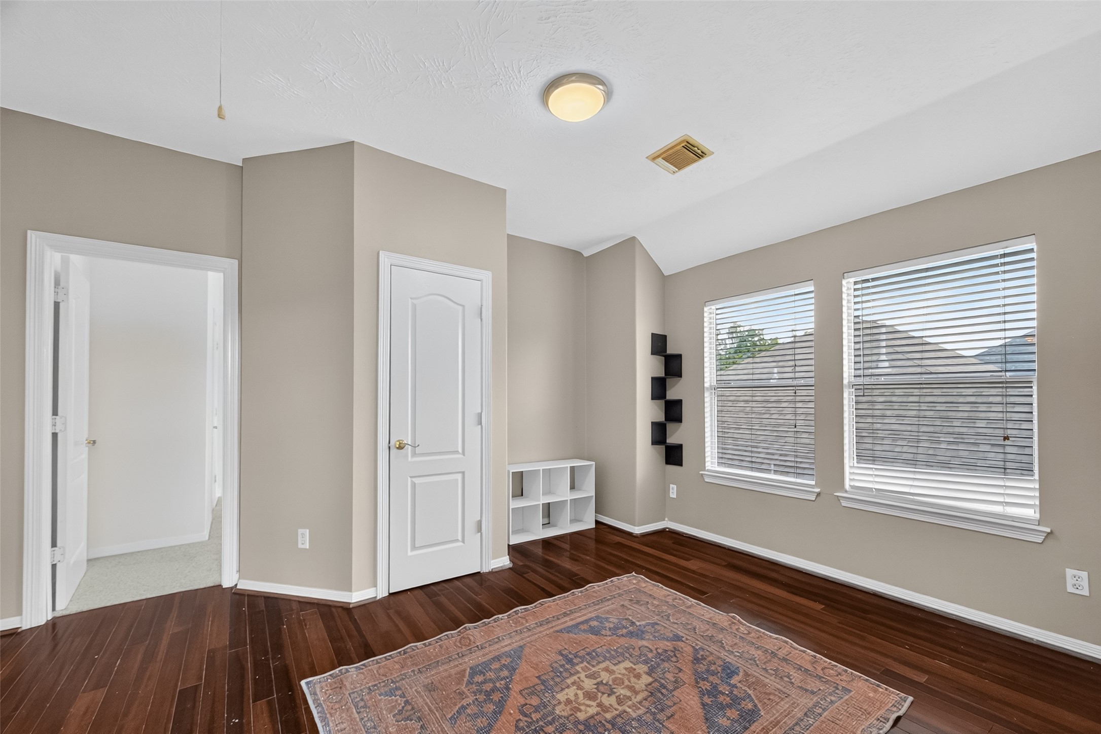 19207 Pinewood Mist Lane Humble, TX 77346 - Photo 19 of 29 a bedroom with a bed and a window