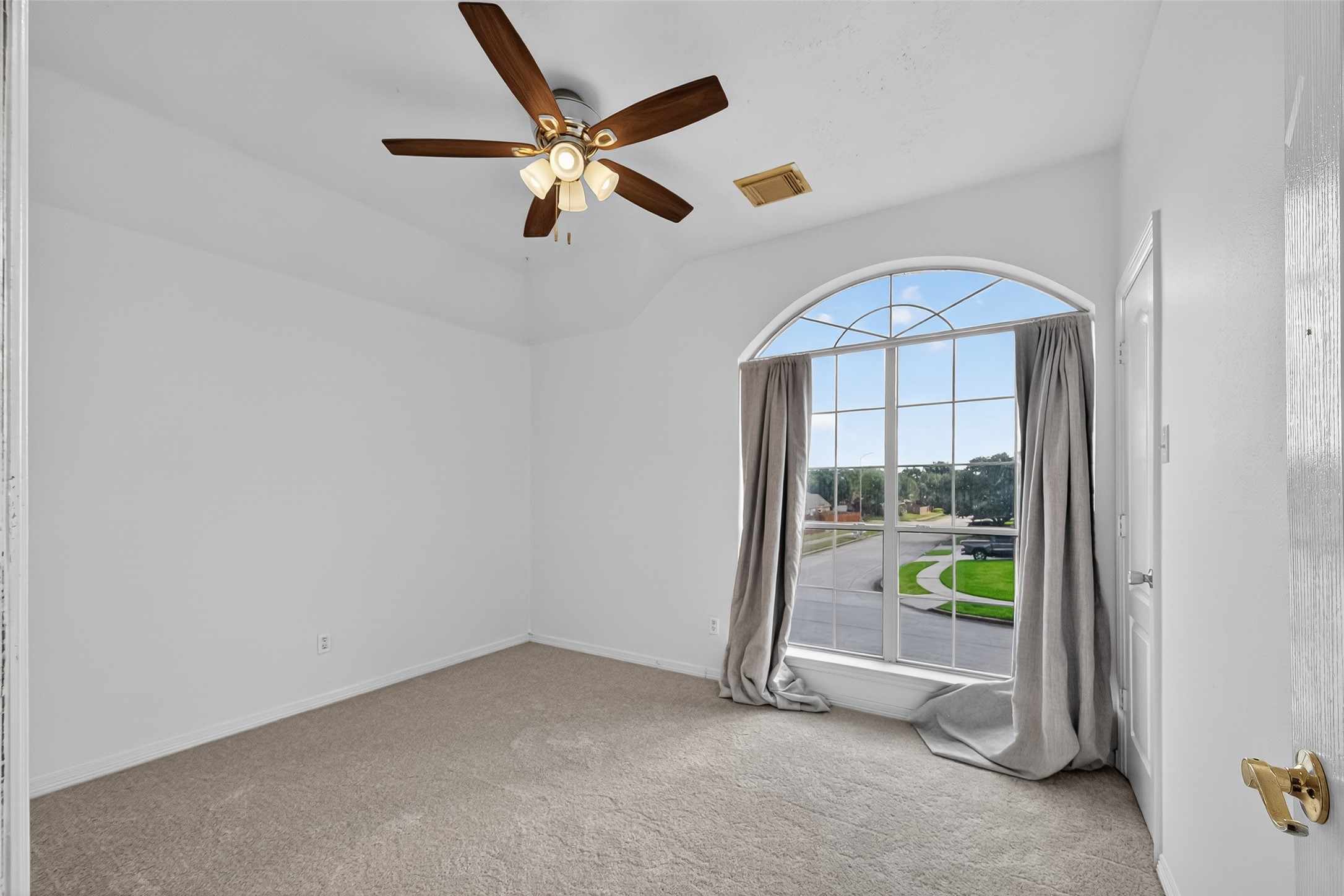 19207 Pinewood Mist Lane Humble, TX 77346 - Photo 21 of 29 an empty room with windows and entrance