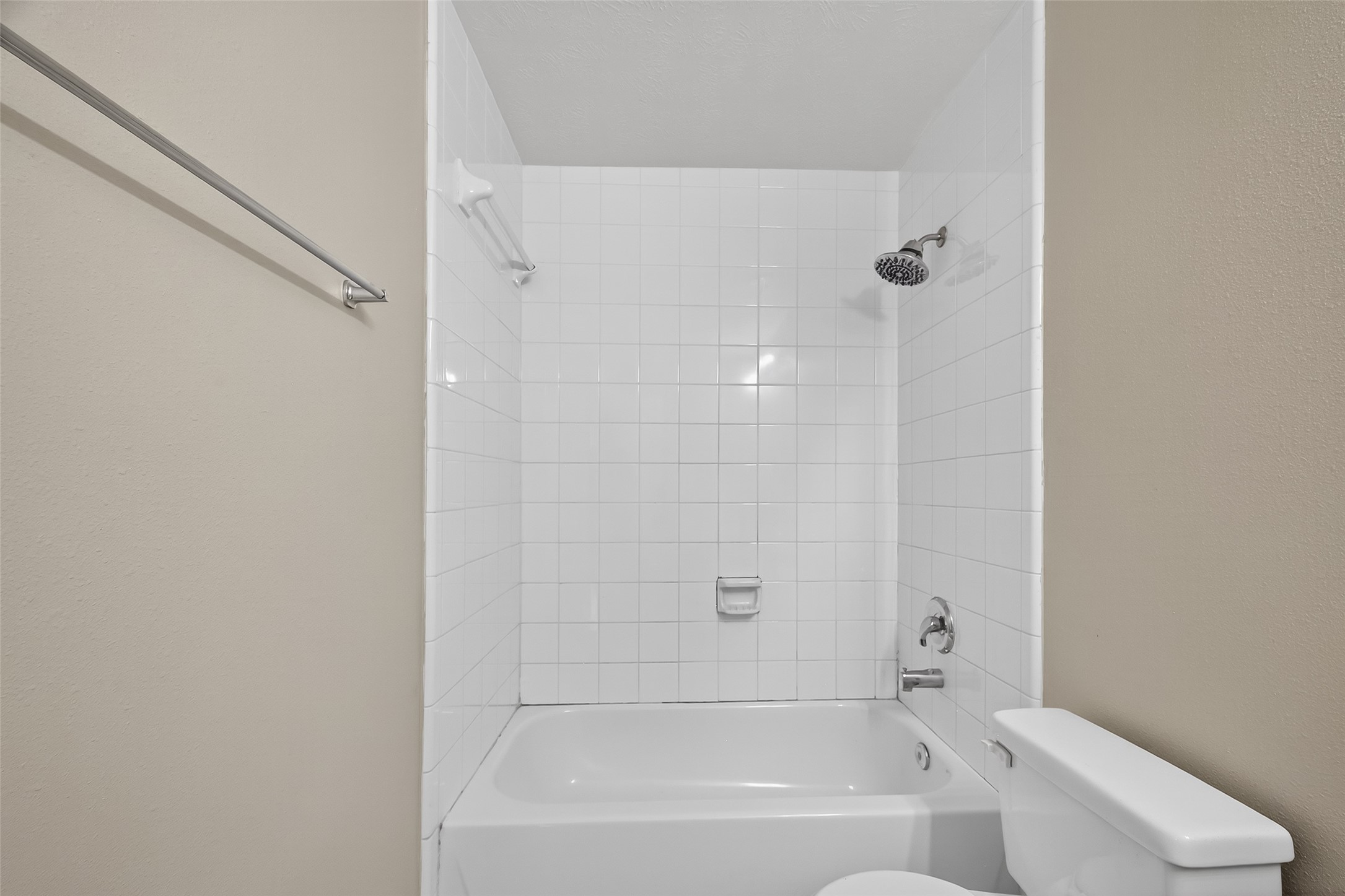 19207 Pinewood Mist Lane Humble, TX 77346 - Photo 26 of 29 a bathroom with a bathtub and shower