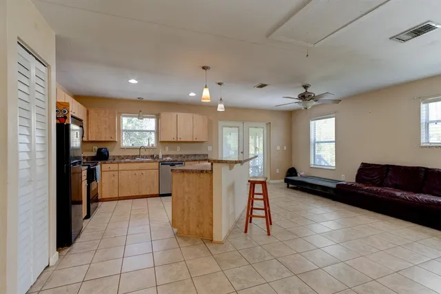 a view of a livingroom with furniture and storage
