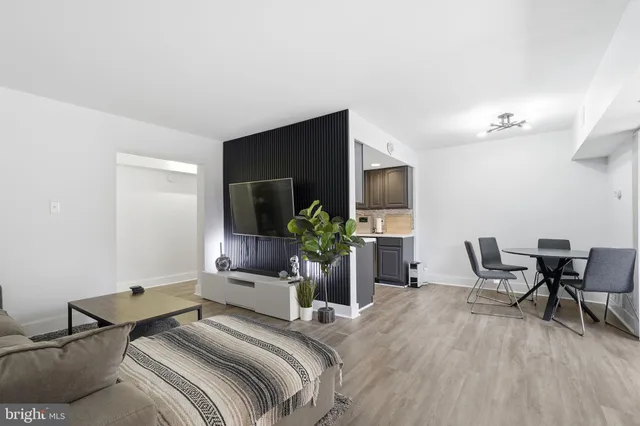 a bedroom with a bed and chair