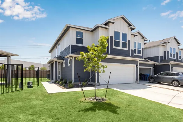 a house view with a garden space