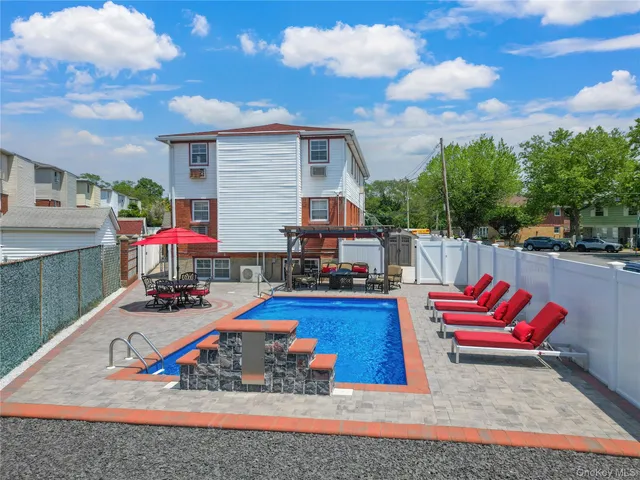 a view of a chairs in front of house