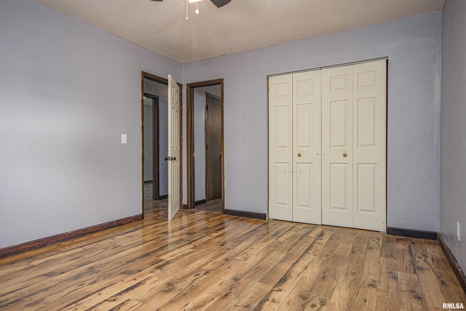 518 Roddy Road Salem, IL 62881 - Photo 19 of 24 a view of an empty room with wooden floor