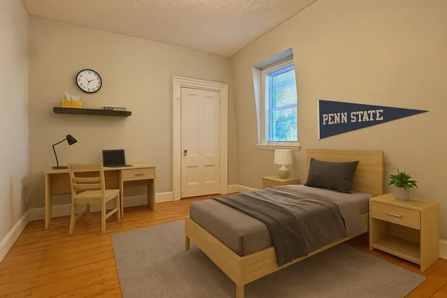 a bedroom with a bed and furniture