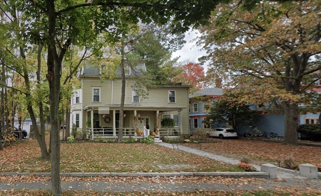 399 Newtonville Avenue, Unit 2 Newton, MA 02460 - Photo 24 of 24 a front view of a house with garden