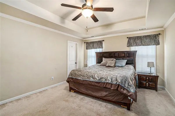 a bathroom with a sink a mirror and a shower