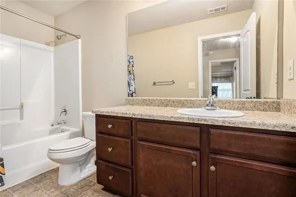 a view of a room with rack on the wall