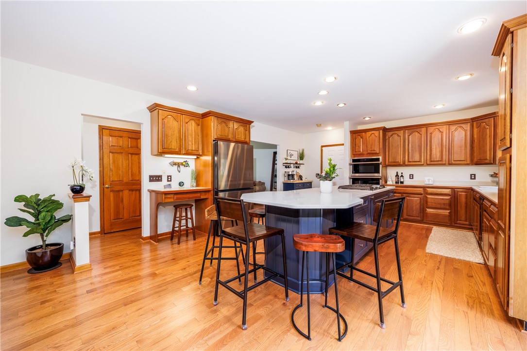 210 Buck Hill Road Greece, NY 14626 - Photo 8 of 49 DINING AREA OF GREAT ROOM