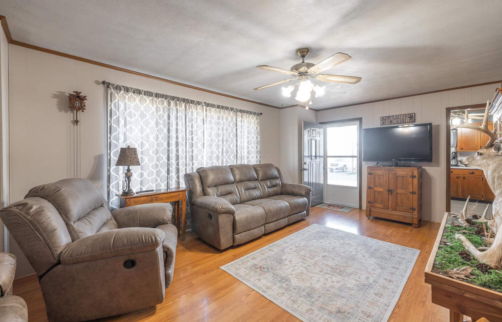 1740 Brier Creek Road, Unit 1 Harrisburg, IL 62946 - Photo 15 of 52 a living room with furniture and a flat screen tv