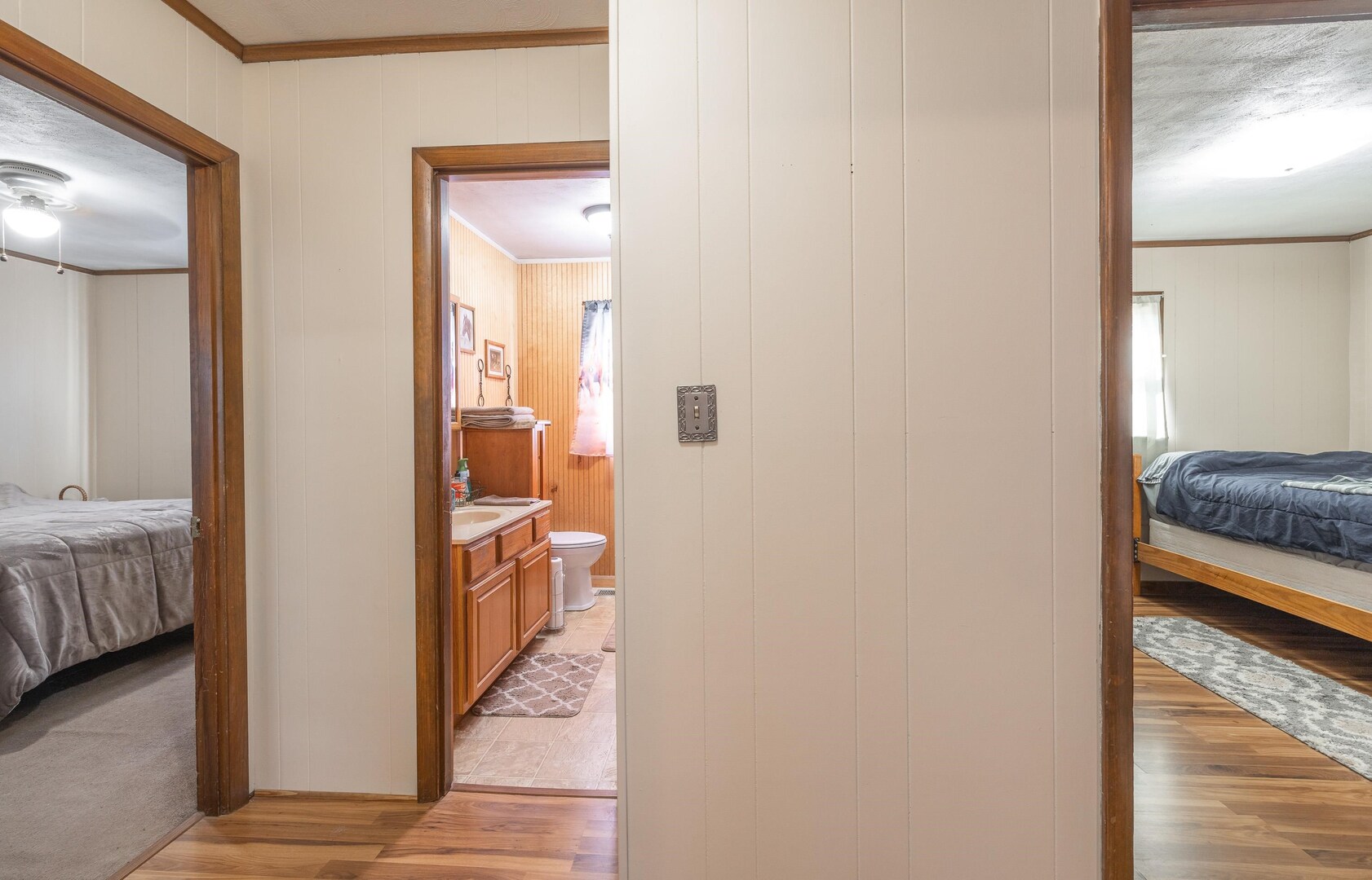 1740 Brier Creek Road, Unit 1 Harrisburg, IL 62946 - Photo 21 of 52 a view of a hallway and a livingroom with furniture