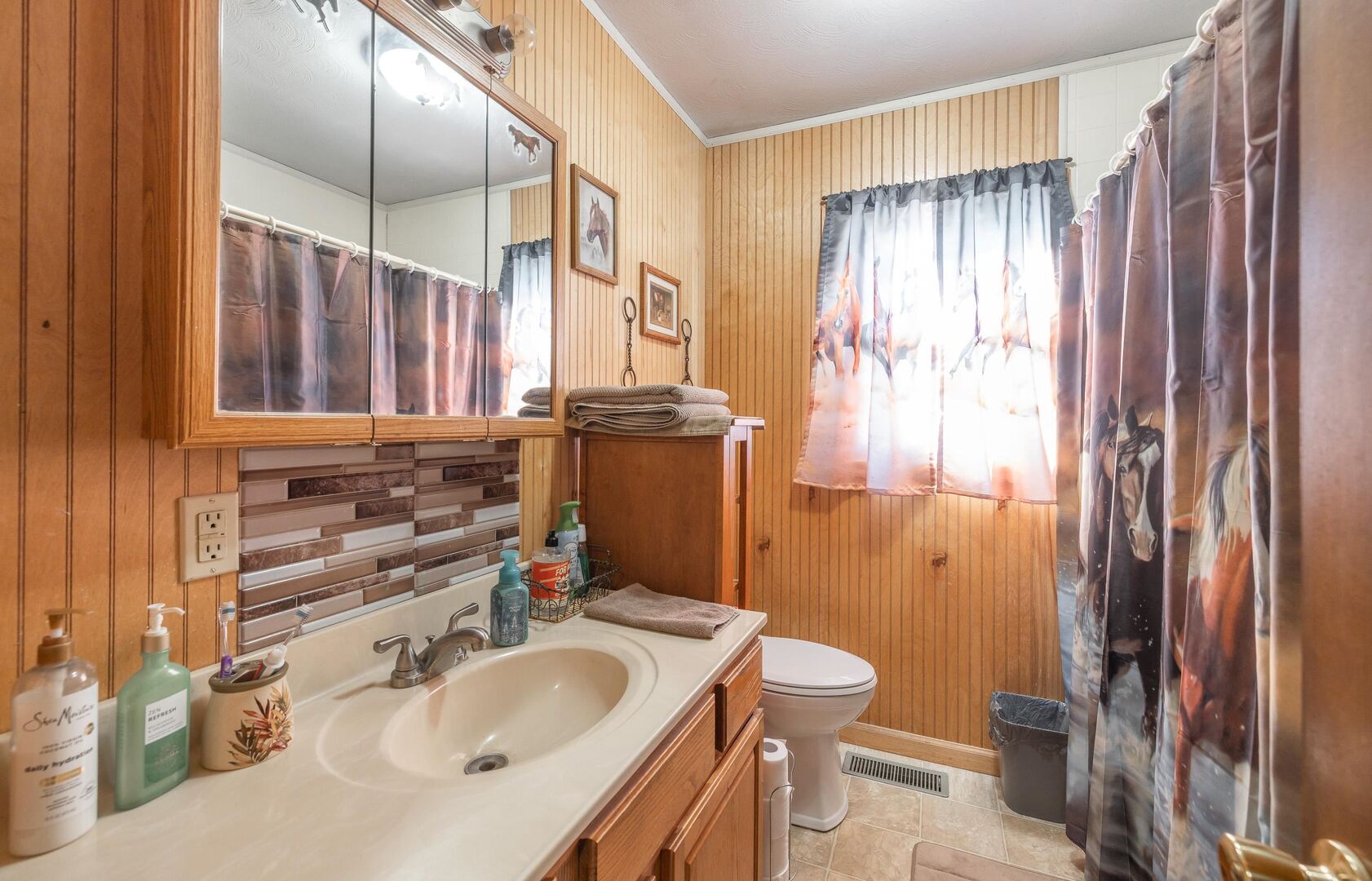 1740 Brier Creek Road, Unit 1 Harrisburg, IL 62946 - Photo 25 of 52 a bathroom with a sink double vanity and a mirror