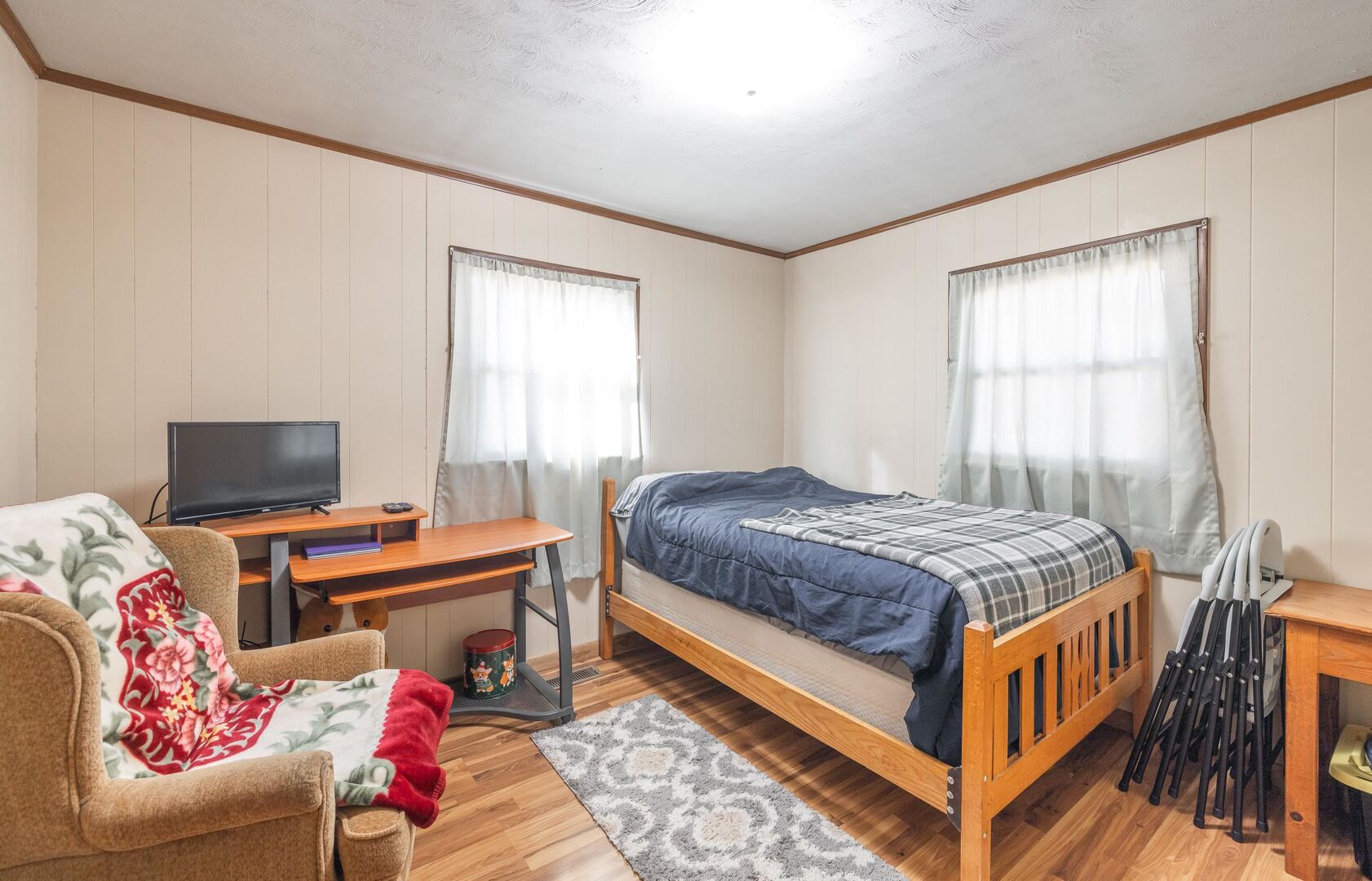 1740 Brier Creek Road, Unit 1 Harrisburg, IL 62946 - Photo 26 of 52 a bedroom with a bed and a window