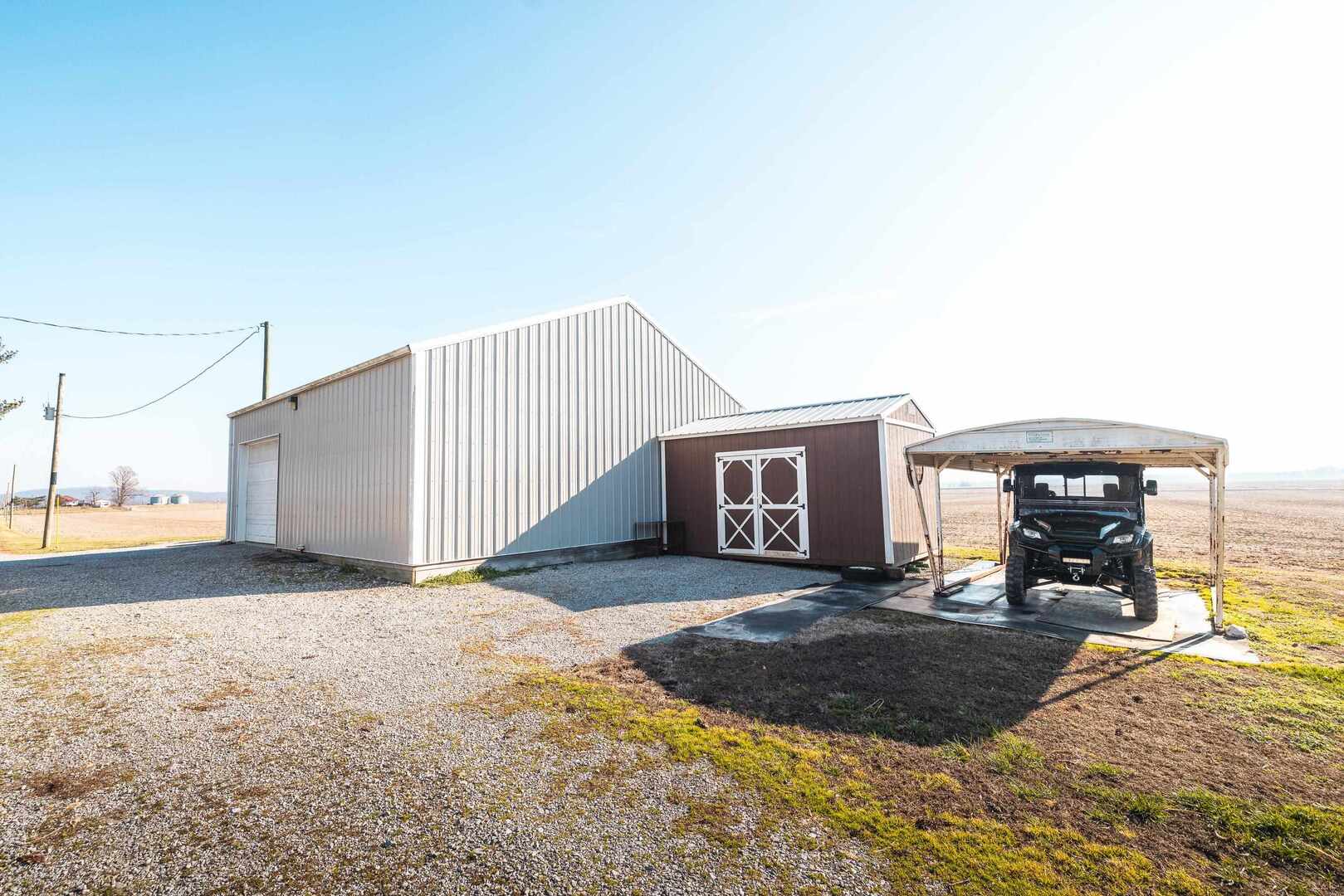 1740 Brier Creek Road, Unit 1 Harrisburg, IL 62946 - Photo 27 of 52 a view of a house with backyard and sitting area
