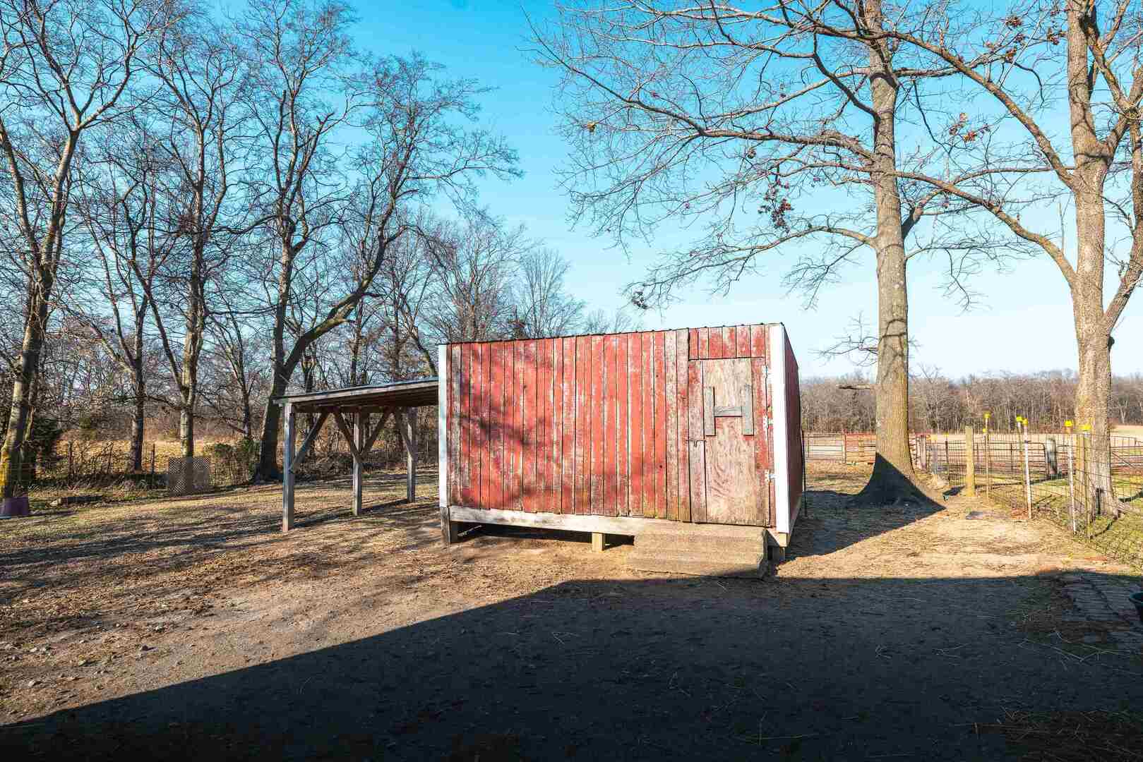 1740 Brier Creek Road, Unit 1 Harrisburg, IL 62946 - Photo 43 of 52 a view of backyard with large tree and wooden fence