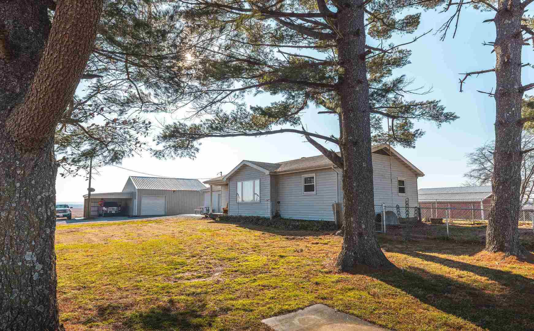 1740 Brier Creek Road, Unit 1 Harrisburg, IL 62946 - Photo 8 of 52 a view of a house with pool and tree s