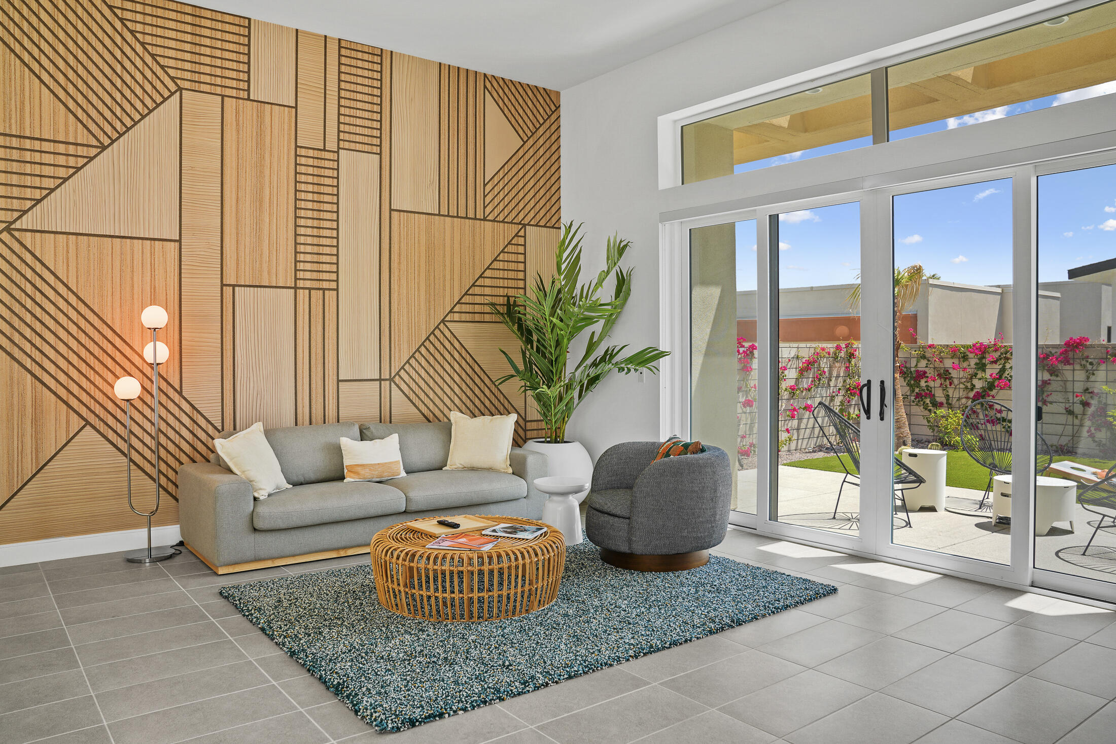 761 Nugget Lane Palm Springs, CA 92262 - Photo 1 of 48 a living room with furniture and a floor to ceiling window