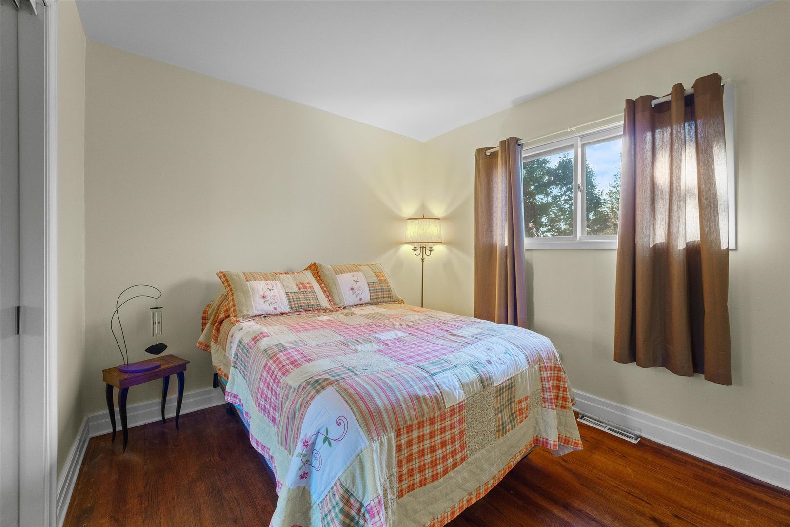 29W246 Lee Road West Chicago, IL 60185 - Photo 12 of 21 a bedroom with a bed and a window