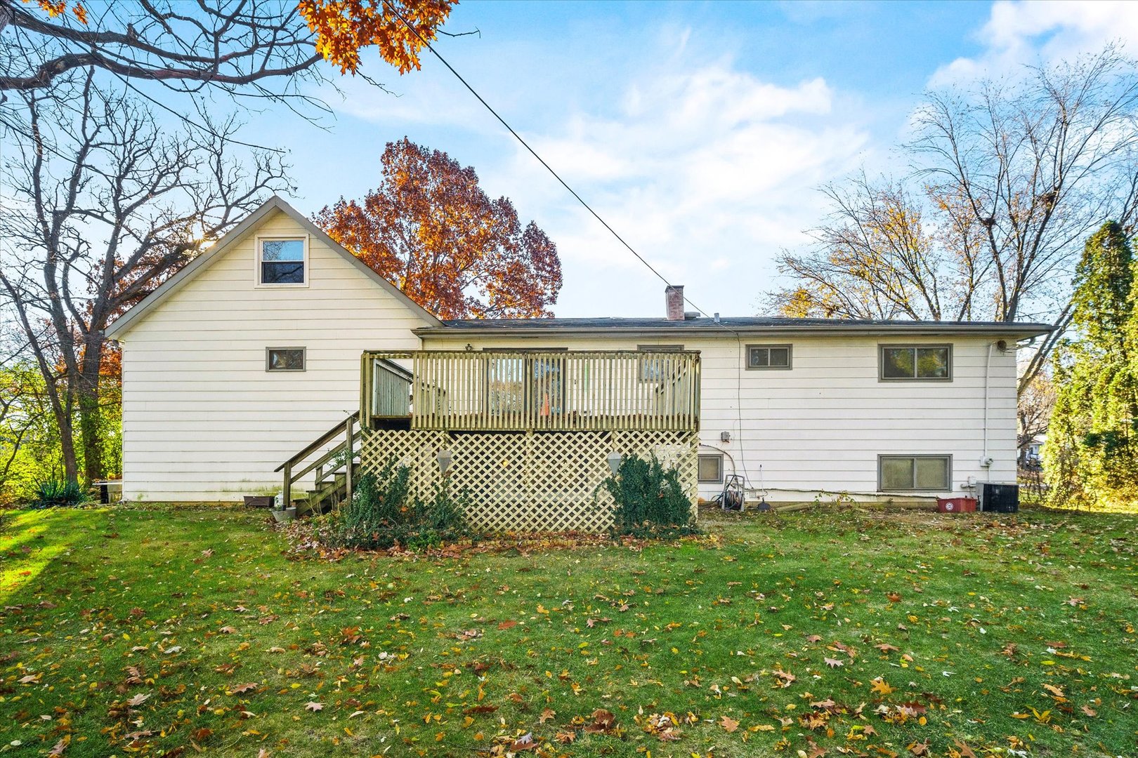 29W246 Lee Road West Chicago, IL 60185 - Photo 18 of 21 a front view of a house with a garden