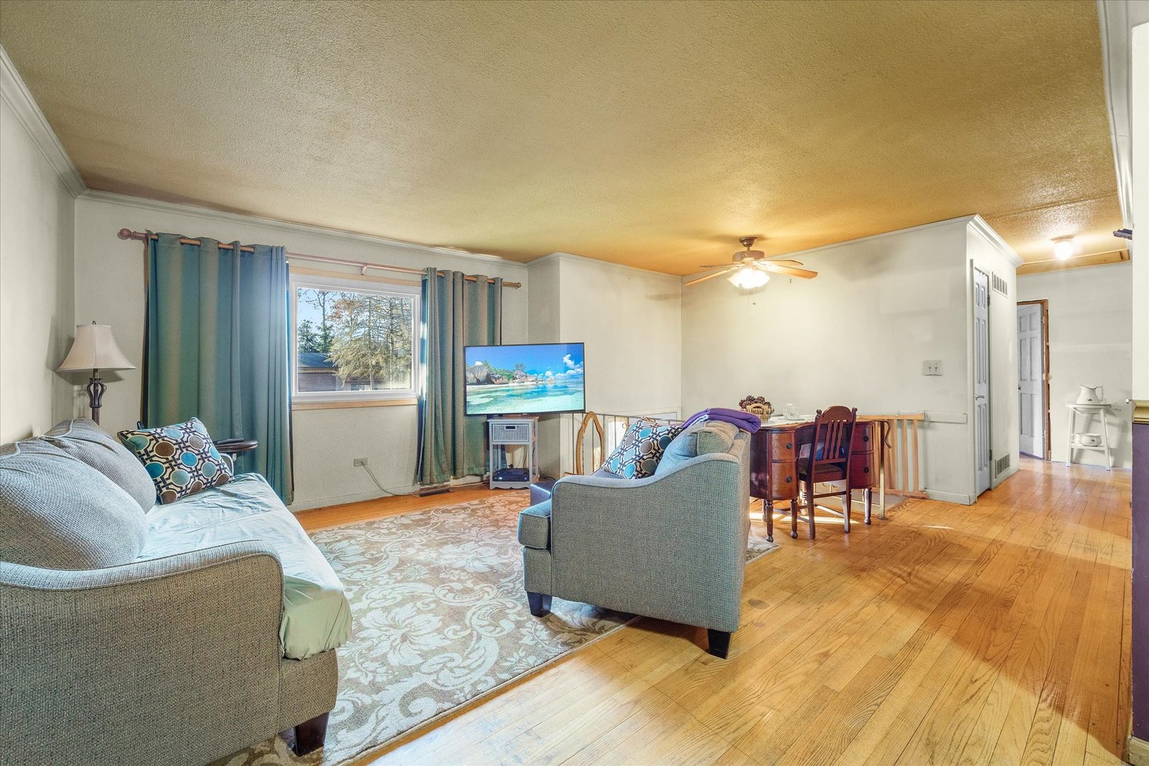 29W246 Lee Road West Chicago, IL 60185 - Photo 3 of 21 a living room with furniture and a table