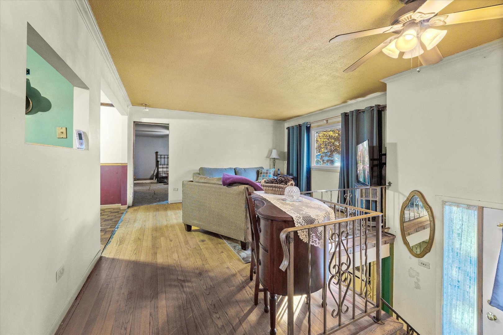 29W246 Lee Road West Chicago, IL 60185 - Photo 4 of 21 a living room with furniture a flat screen tv and a table