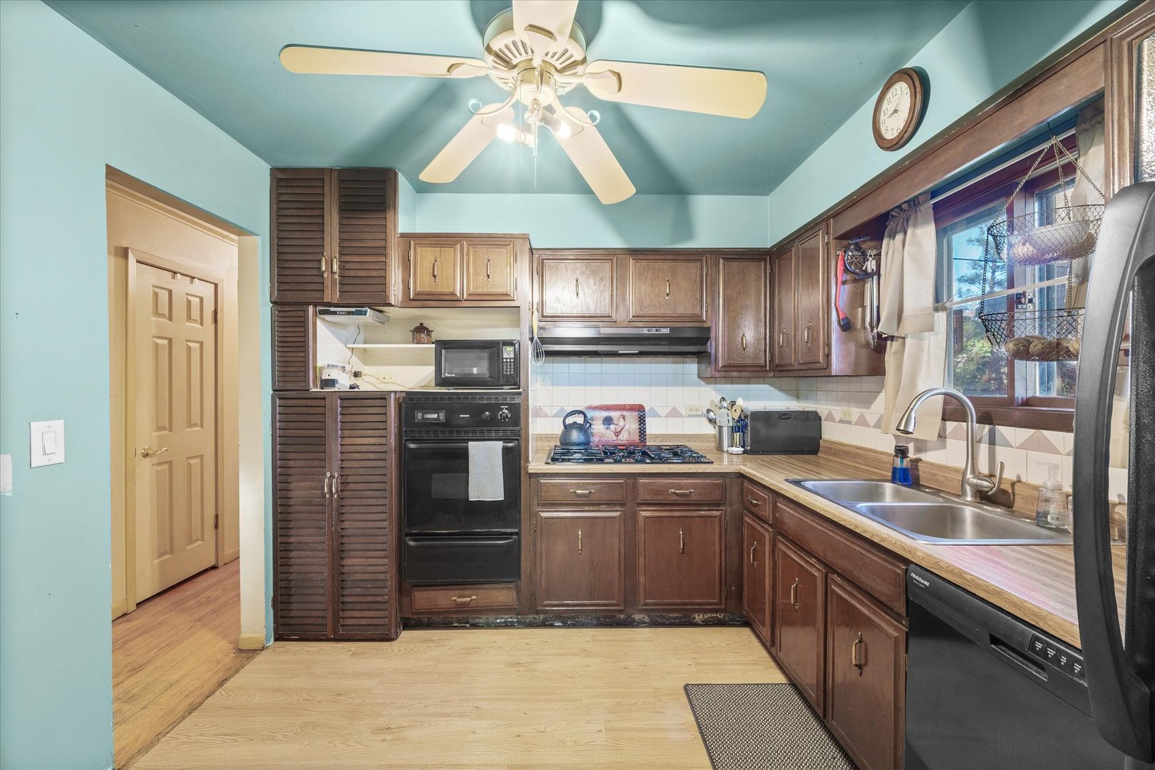 29W246 Lee Road West Chicago, IL 60185 - Photo 6 of 21 a kitchen with stainless steel appliances granite countertop a refrigerator and a sink