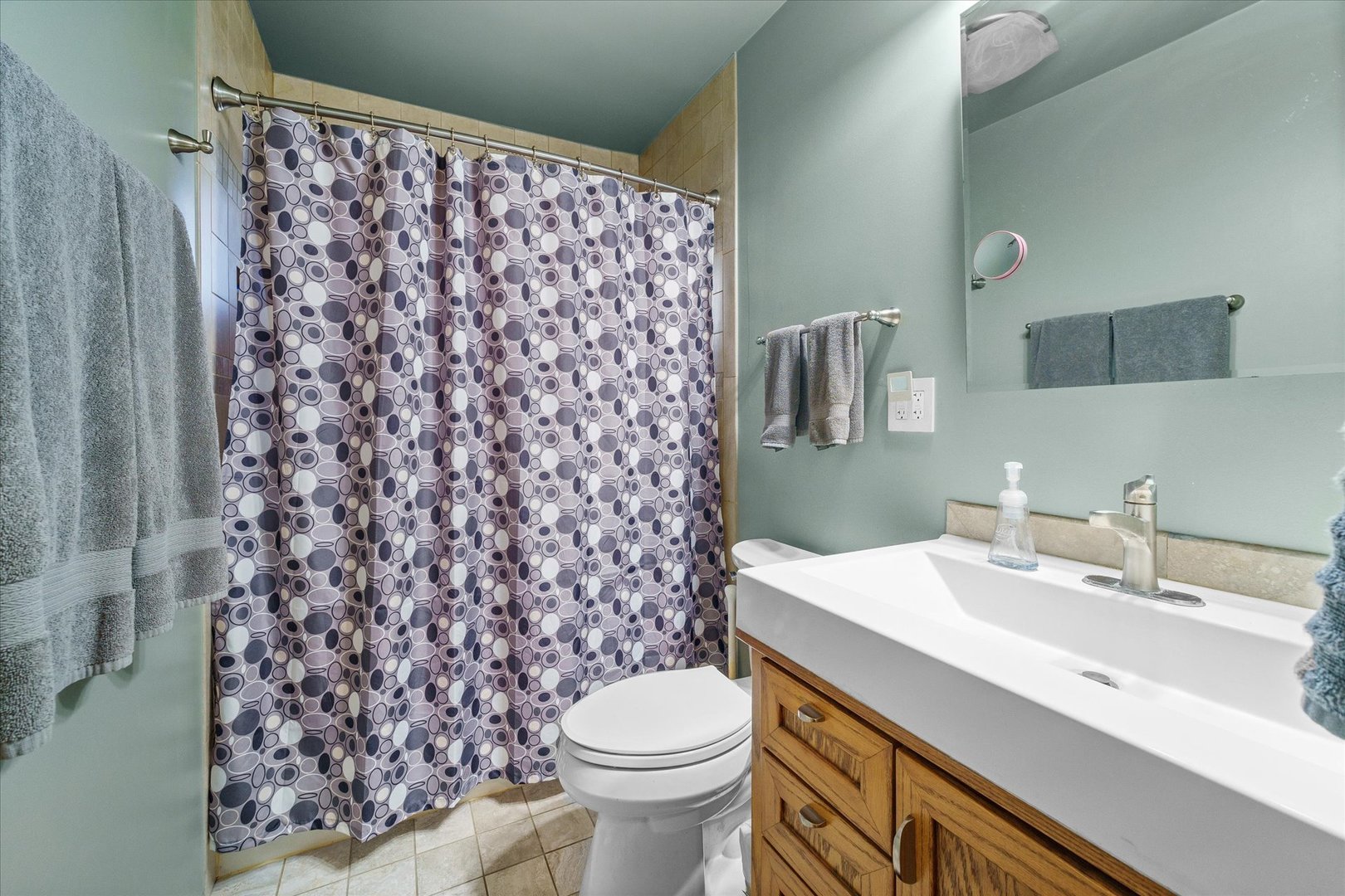 29W246 Lee Road West Chicago, IL 60185 - Photo 10 of 21 a bathroom with a sink toilet and shower