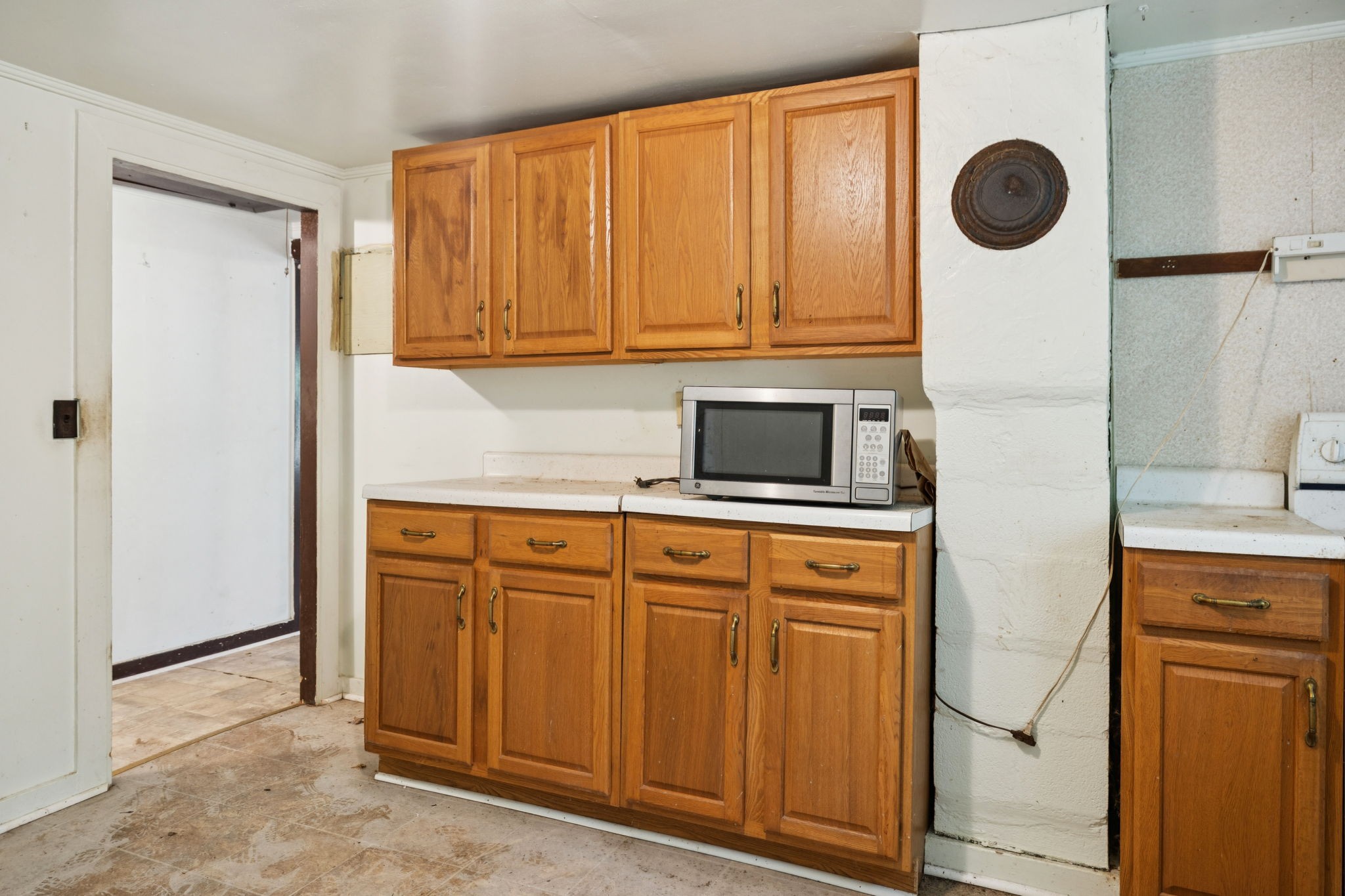 61 Brazzle Road Waverly, TN 37185 - Photo 13 of 36 a kitchen with stainless steel appliances granite countertop a refrigerator and a sink