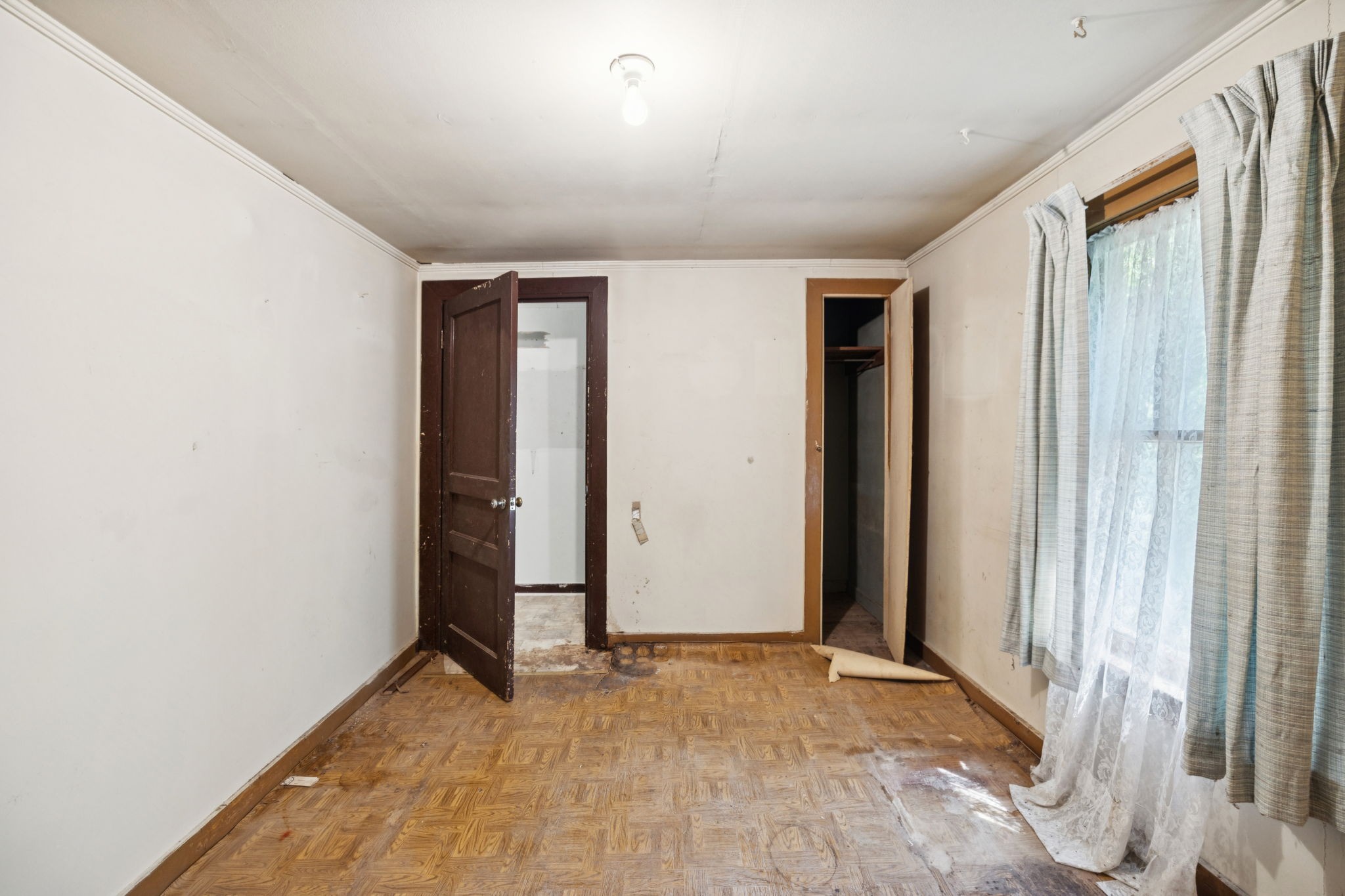 61 Brazzle Road Waverly, TN 37185 - Photo 17 of 36 an empty room with windows