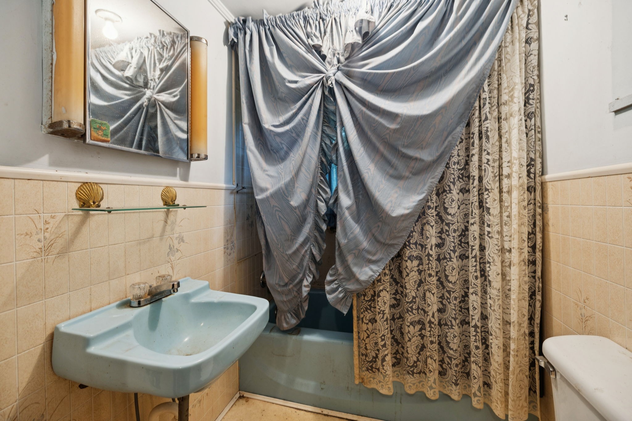 61 Brazzle Road Waverly, TN 37185 - Photo 21 of 36 a bathroom with a sink and a mirror