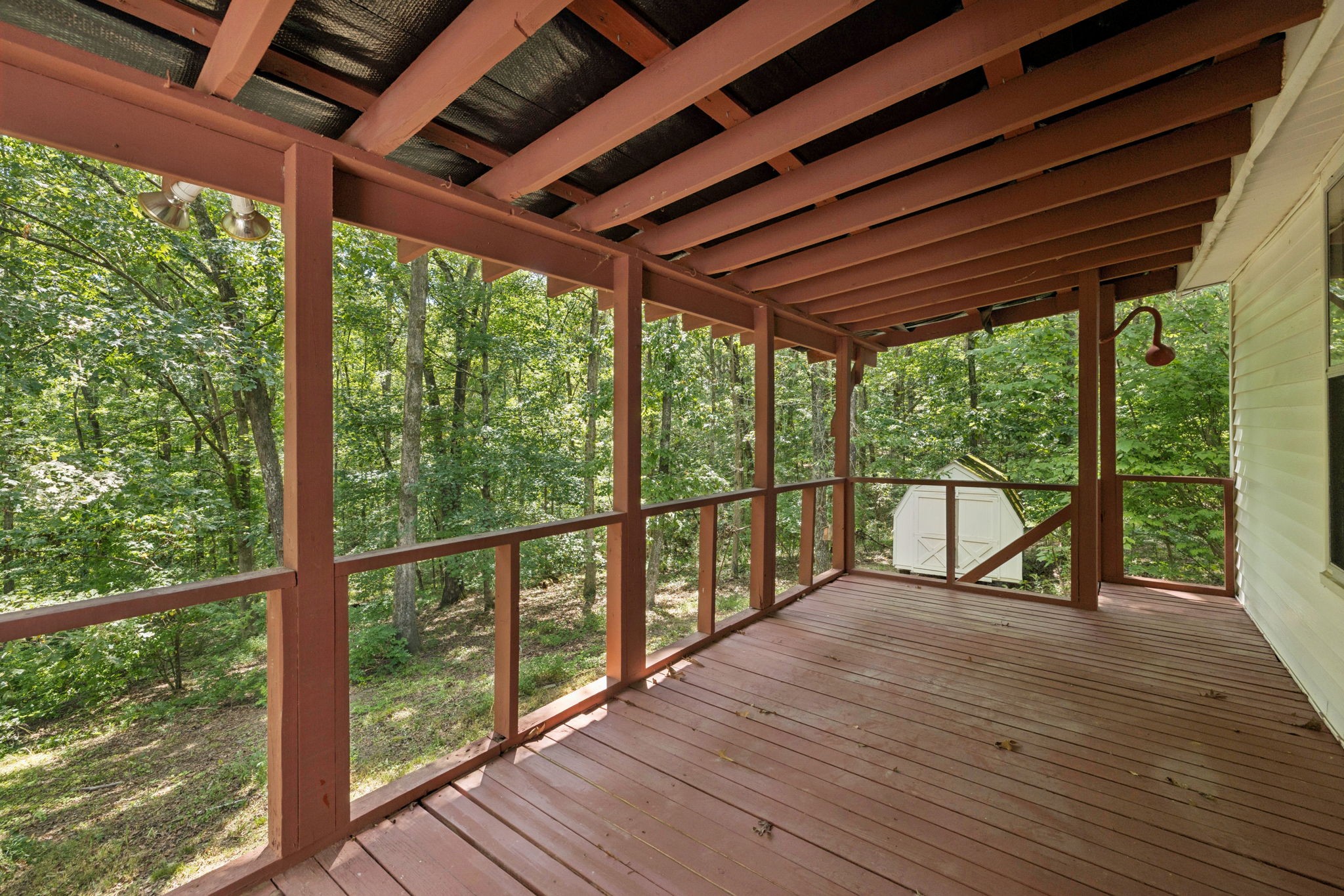 61 Brazzle Road Waverly, TN 37185 - Photo 26 of 36 a view of porch with green trees in front