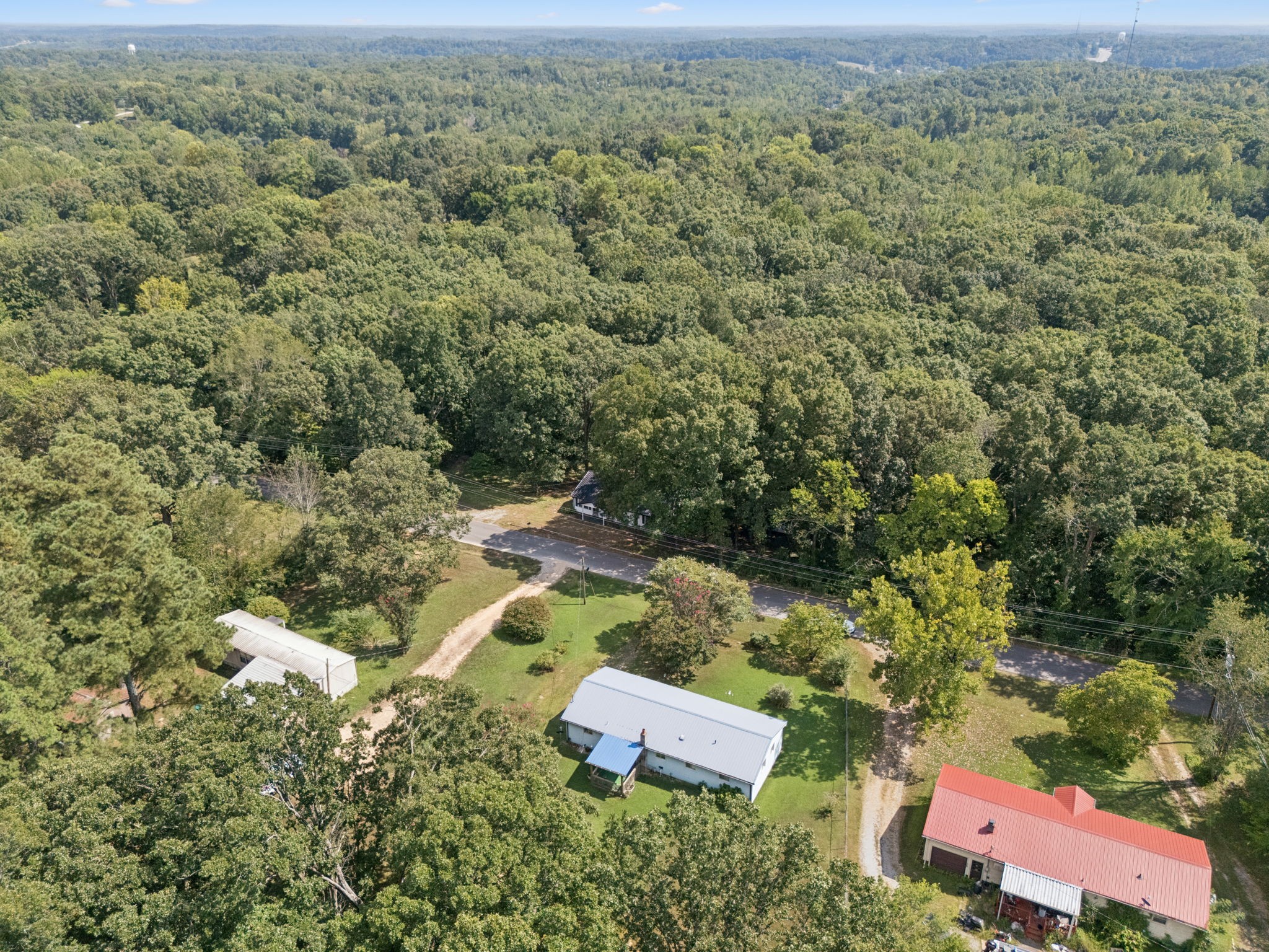 61 Brazzle Road Waverly, TN 37185 - Photo 32 of 36 an aerial view of a house with a yard