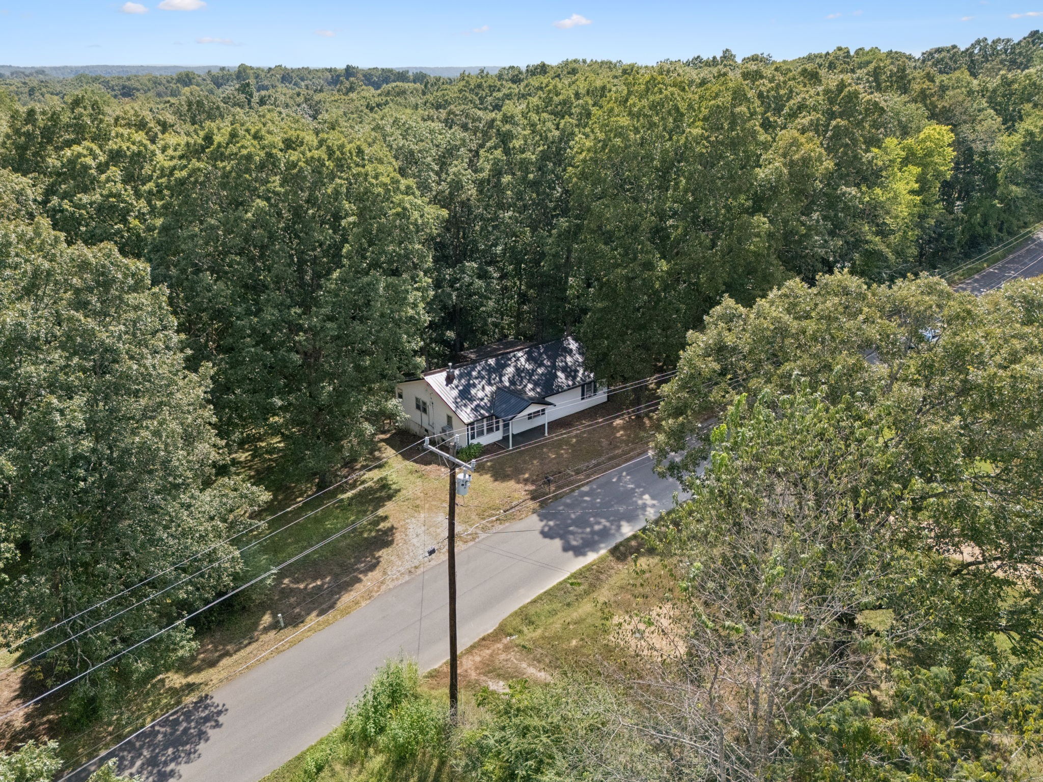 61 Brazzle Road Waverly, TN 37185 - Photo 36 of 36 a view of a backyard with mountain view