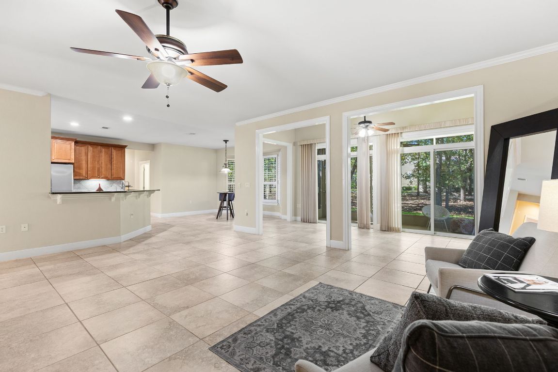 207 Cider Orchard Cove Georgetown, TX 78633 - Photo 21 of 35 a view of a livingroom with furniture and floor to ceiling window