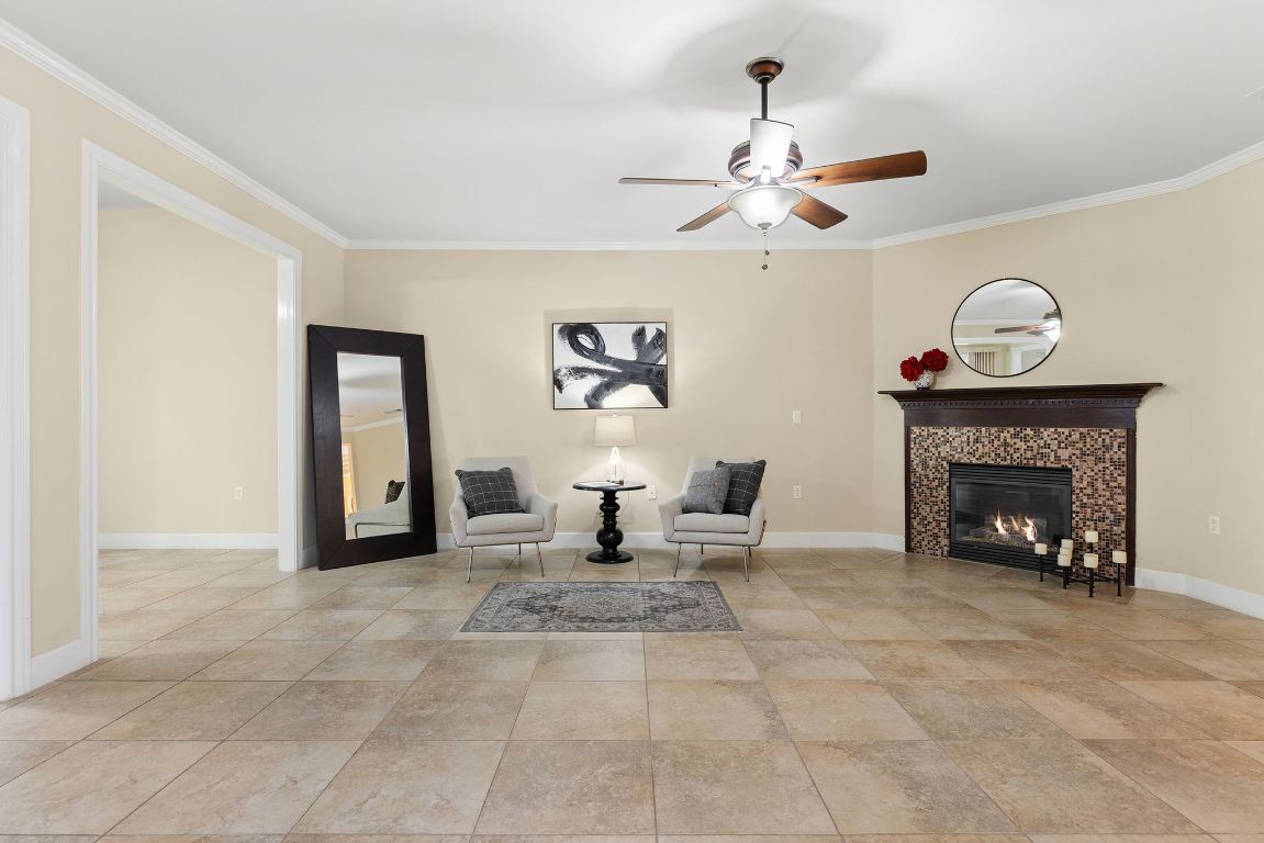 207 Cider Orchard Cove Georgetown, TX 78633 - Photo 22 of 35 a living room with furniture and a fireplace