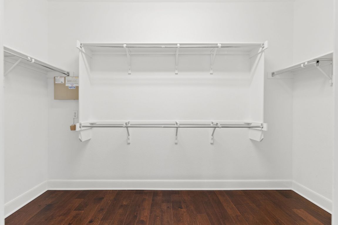 207 Cider Orchard Cove Georgetown, TX 78633 - Photo 28 of 35 a view of walk in closet with empty racks