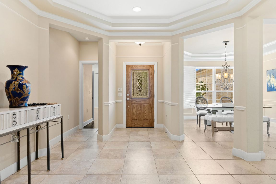 207 Cider Orchard Cove Georgetown, TX 78633 - Photo 6 of 35 a view of a hallway with furniture and windows