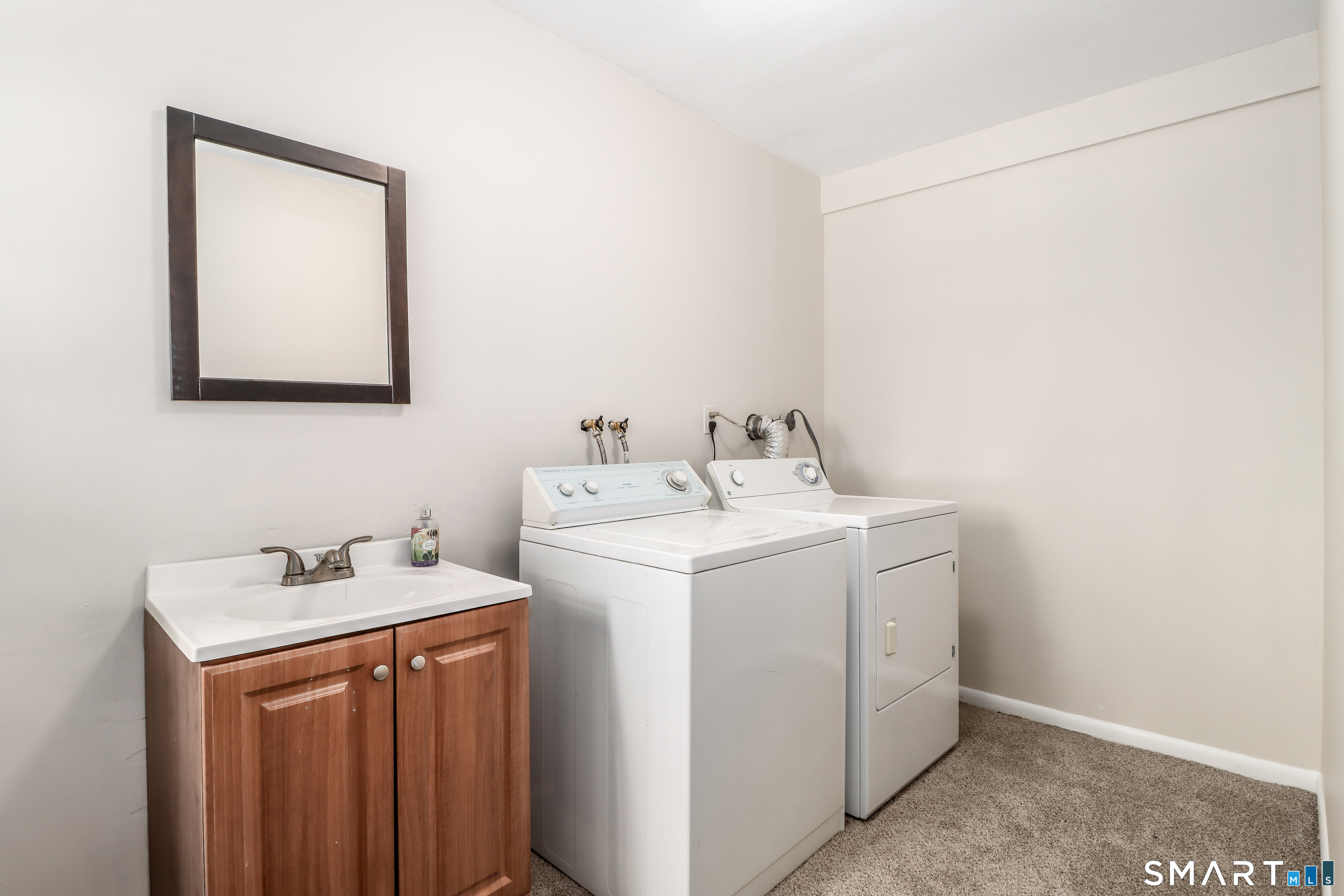 24 Prospect Drive Brookfield, CT 06804 - Photo 25 of 35 a utility room with dryer and washer