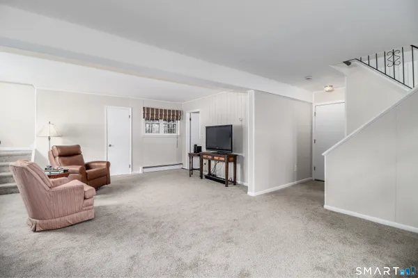 a picture of a room with a white wall and a white wall
