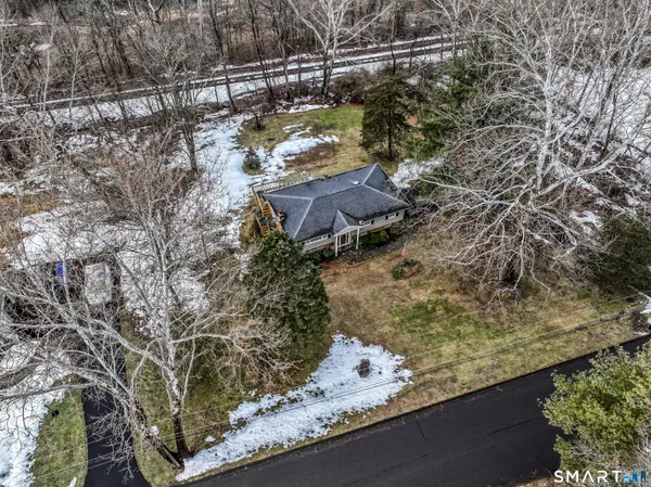 a aerial view of residential house with outdoor space