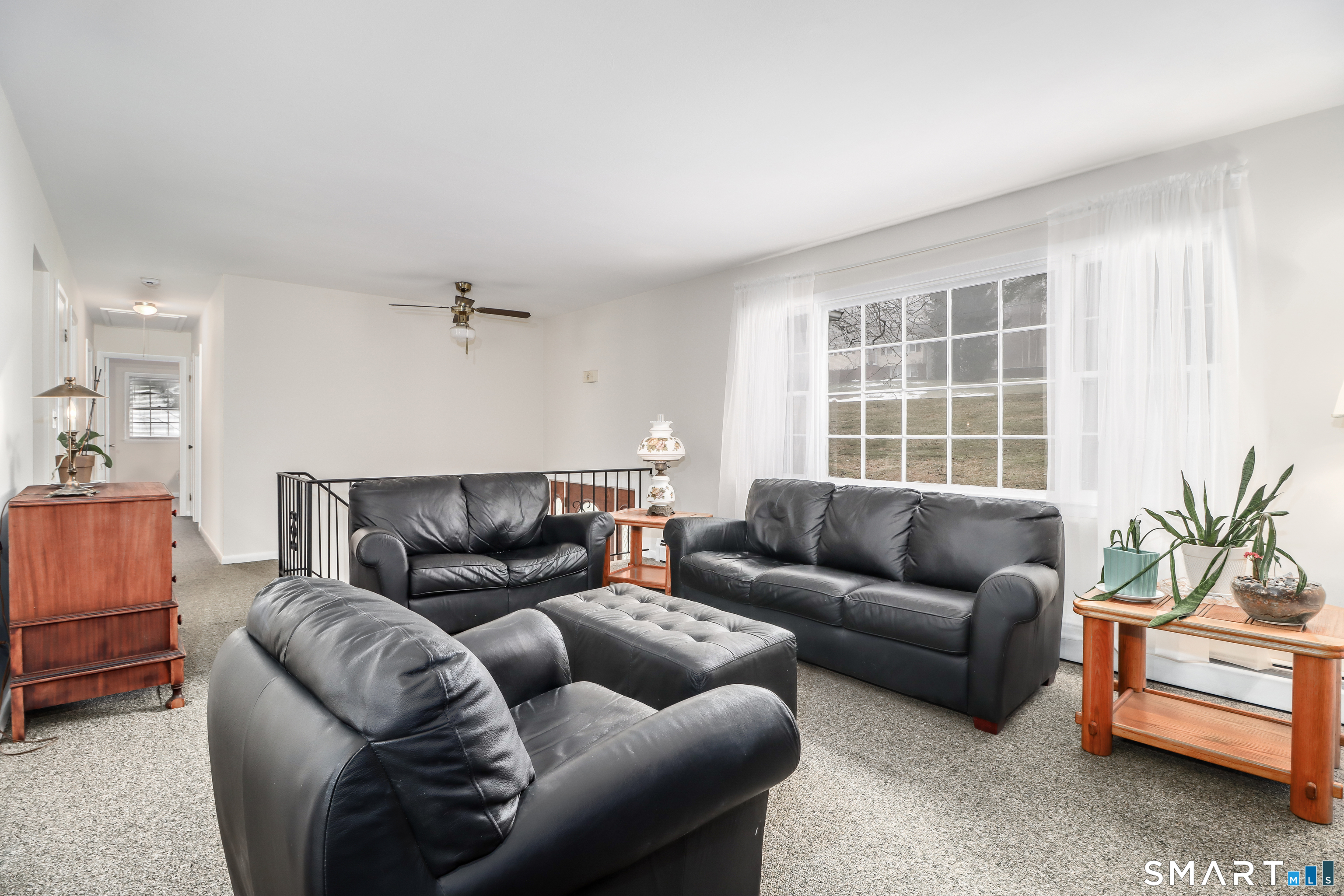 24 Prospect Drive Brookfield, CT 06804 - Photo 5 of 35 a living room with furniture and a large window