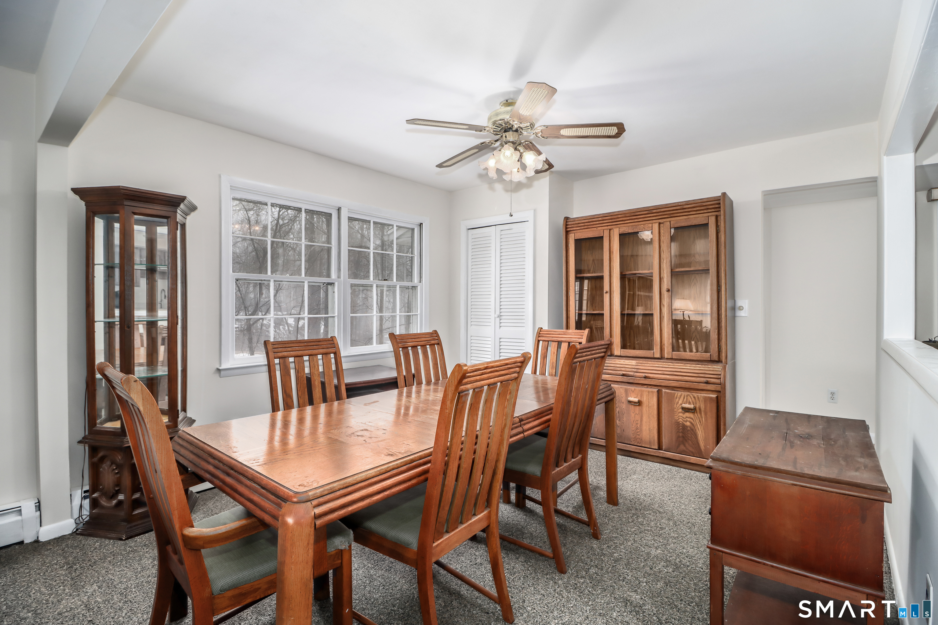 24 Prospect Drive Brookfield, CT 06804 - Photo 7 of 35 a view of a dining room with furniture window and outside view