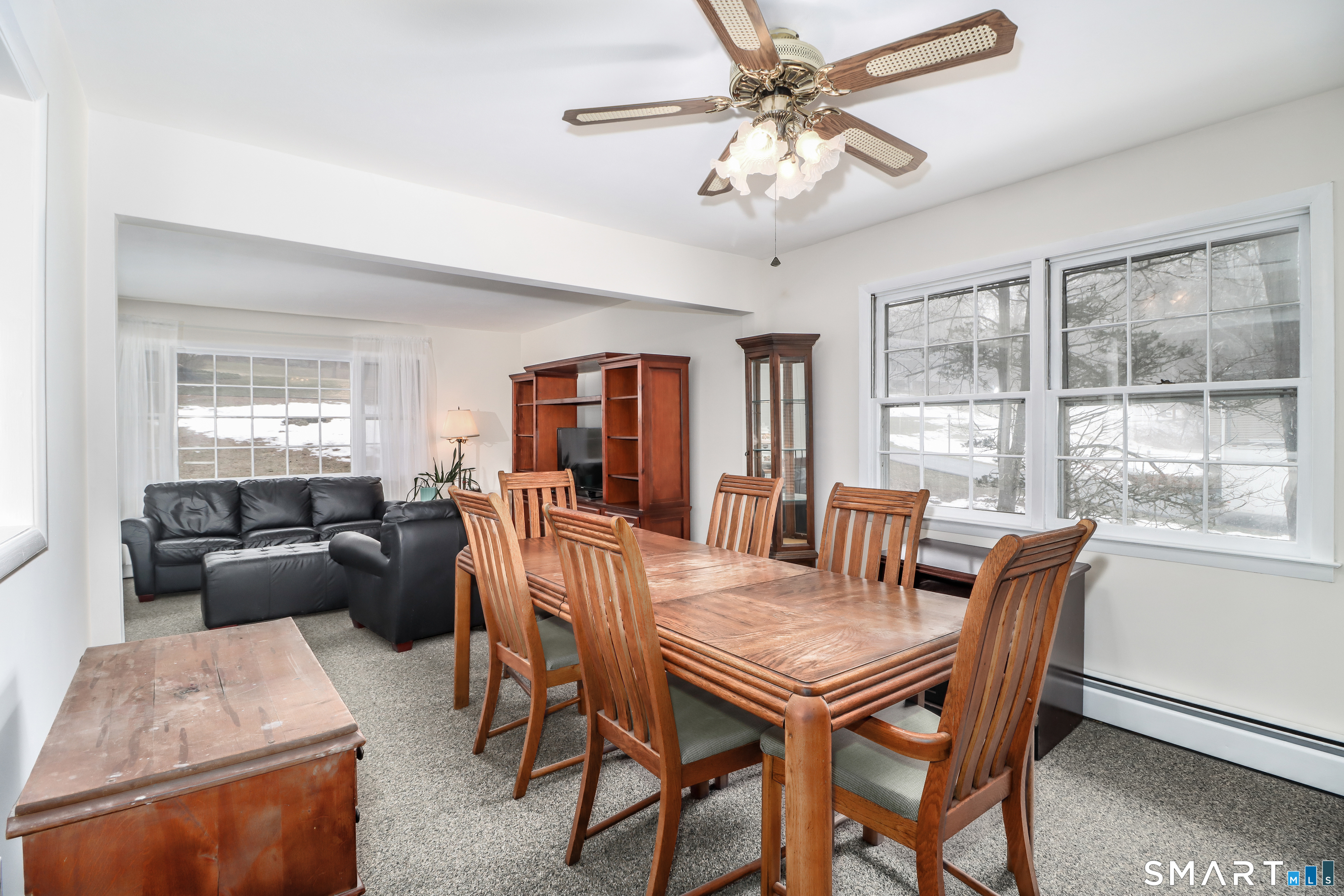 24 Prospect Drive Brookfield, CT 06804 - Photo 9 of 35 a view of a dining room with furniture window and outside view