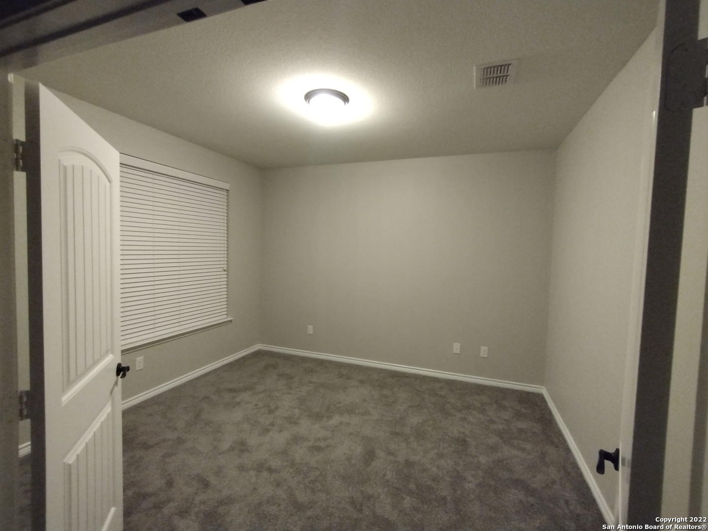 11212 Hill Top Loop Helotes, TX 78023 - Photo 29 of 34 an empty room with a empty space