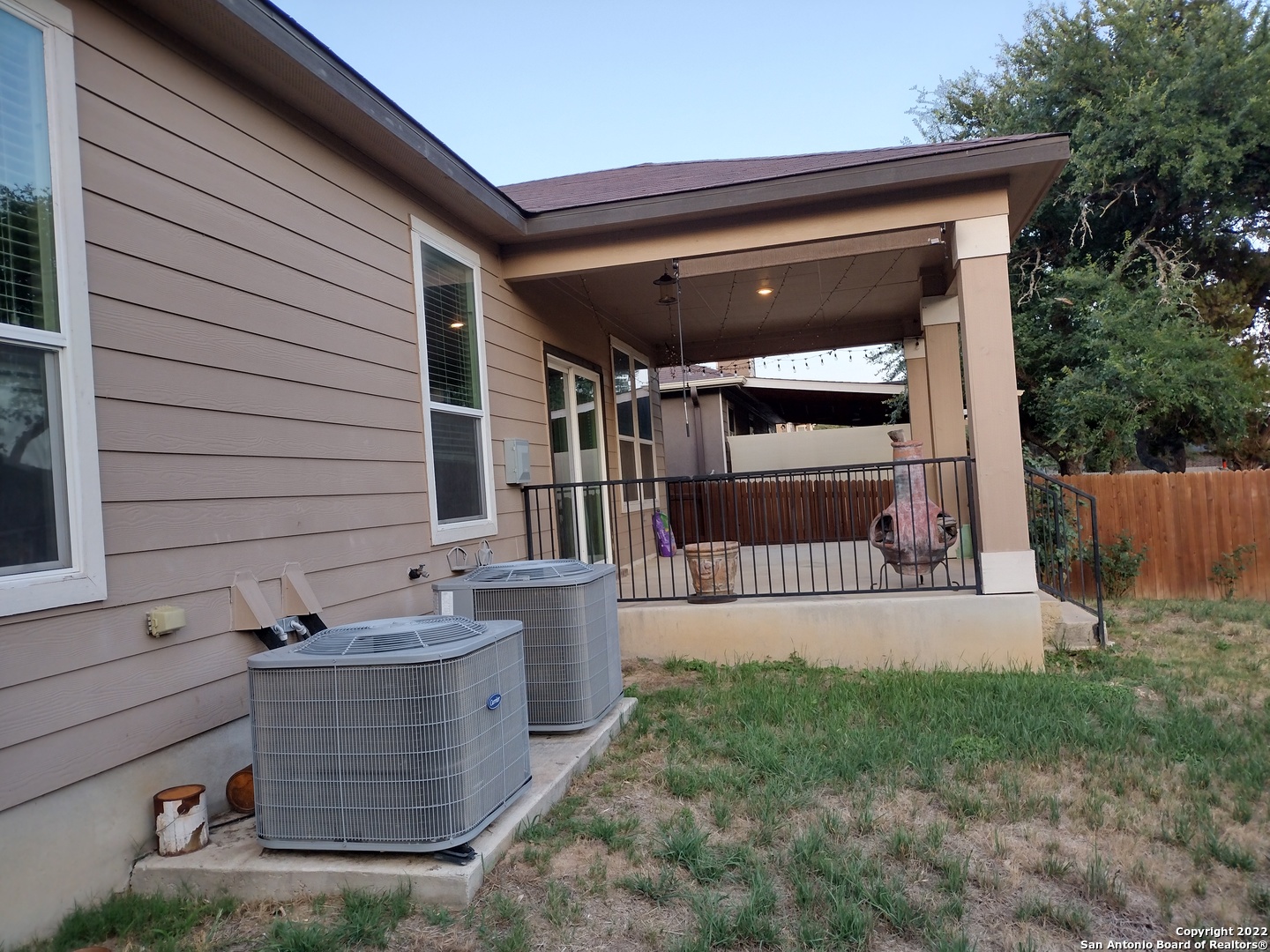 11212 Hill Top Loop Helotes, TX 78023 - Photo 33 of 34 a view of backyard with a small cabin