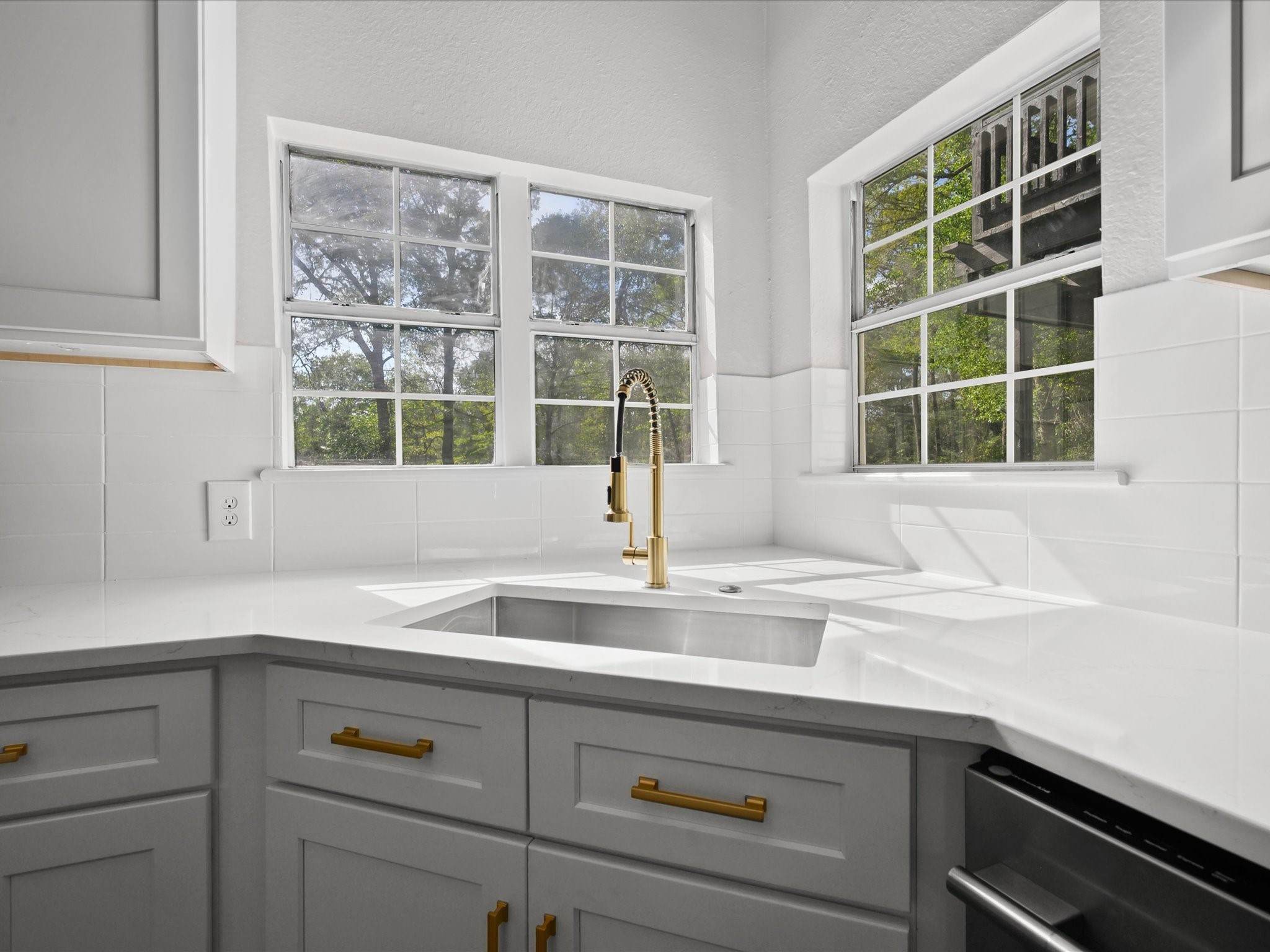 16958 Cedar Road Plantersville, TX 77363 - Photo 12 of 38 a kitchen with a sink and a window