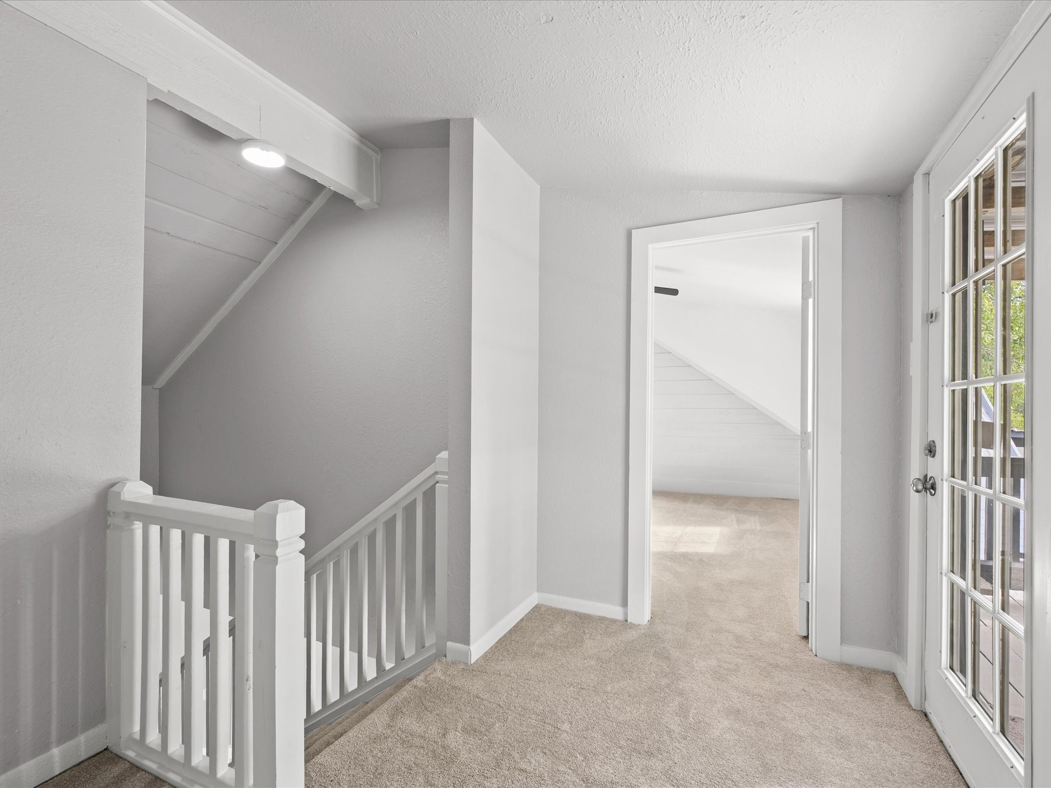 16958 Cedar Road Plantersville, TX 77363 - Photo 26 of 38 a view of a hallway with a livingroom and entryway