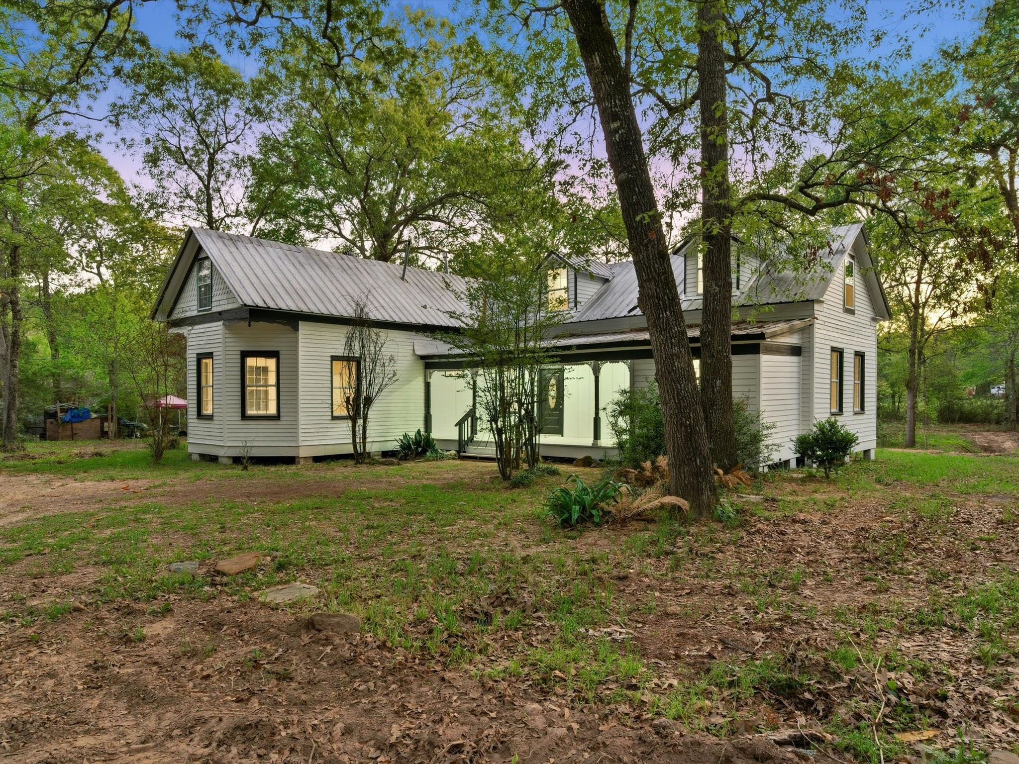 16958 Cedar Road Plantersville, TX 77363 - Photo 31 of 38 a view of a house with a yard and sitting area