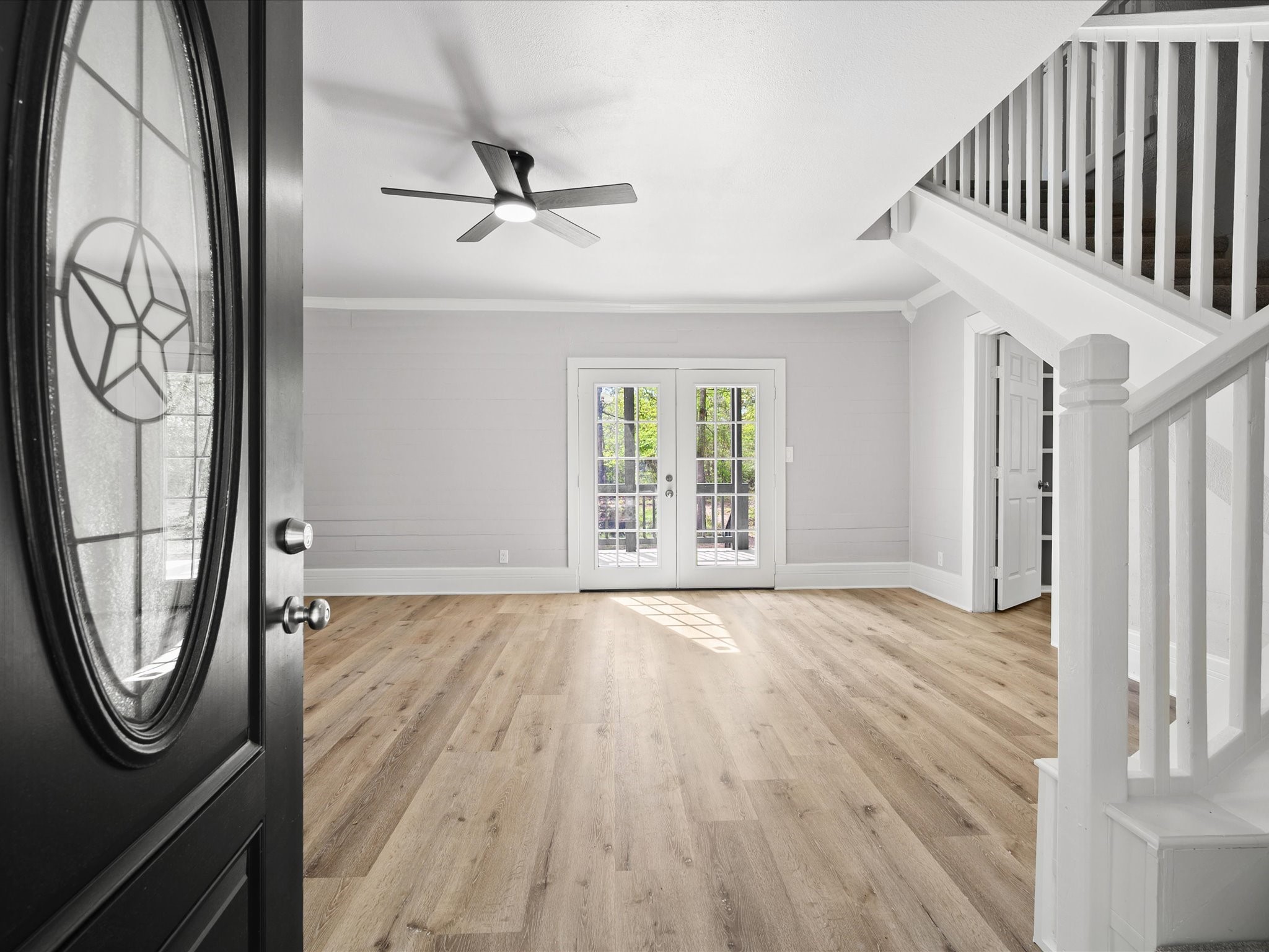 16958 Cedar Road Plantersville, TX 77363 - Photo 6 of 38 a view of an entryway with wooden floor